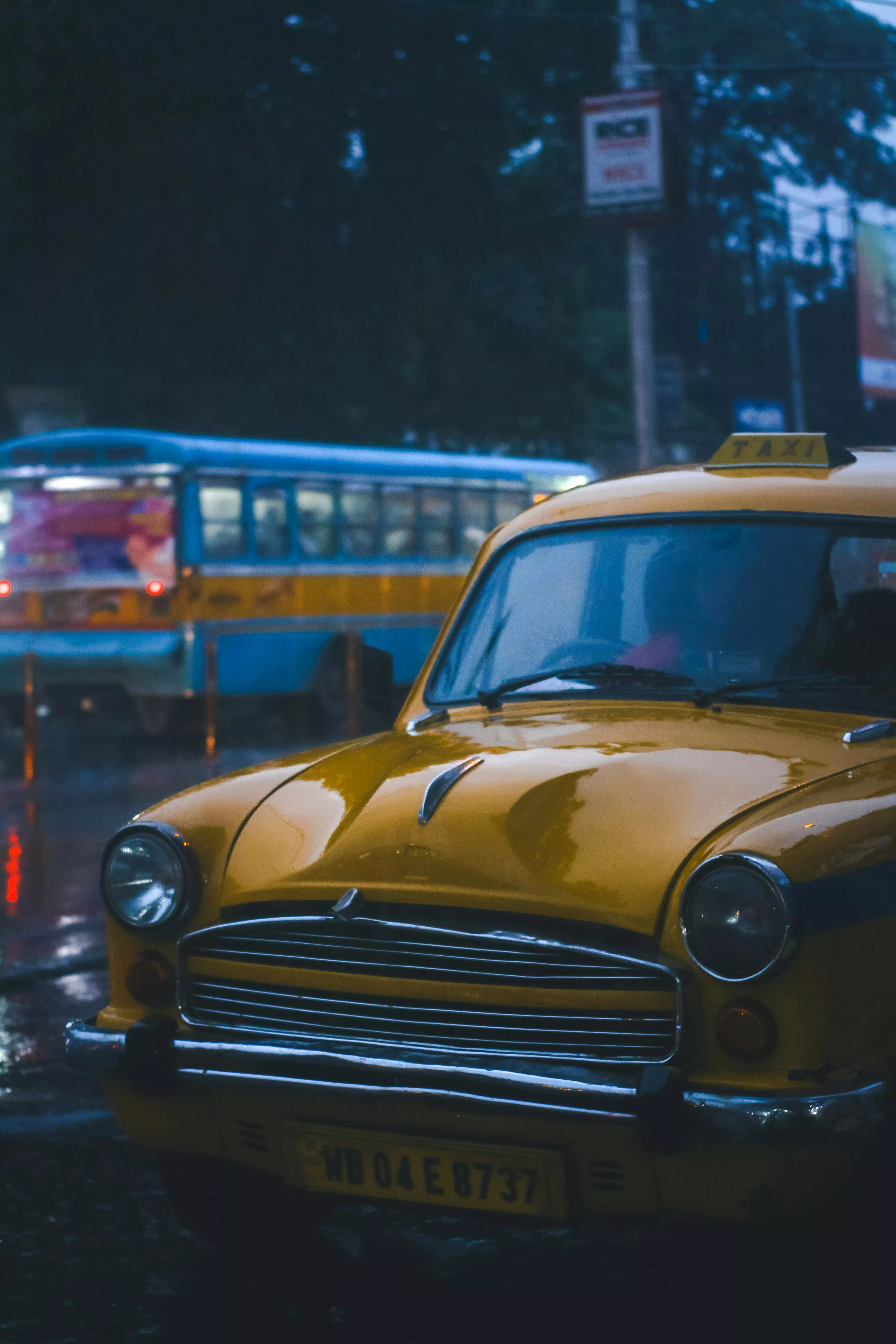 Yellow taxi on the street · Free Stock