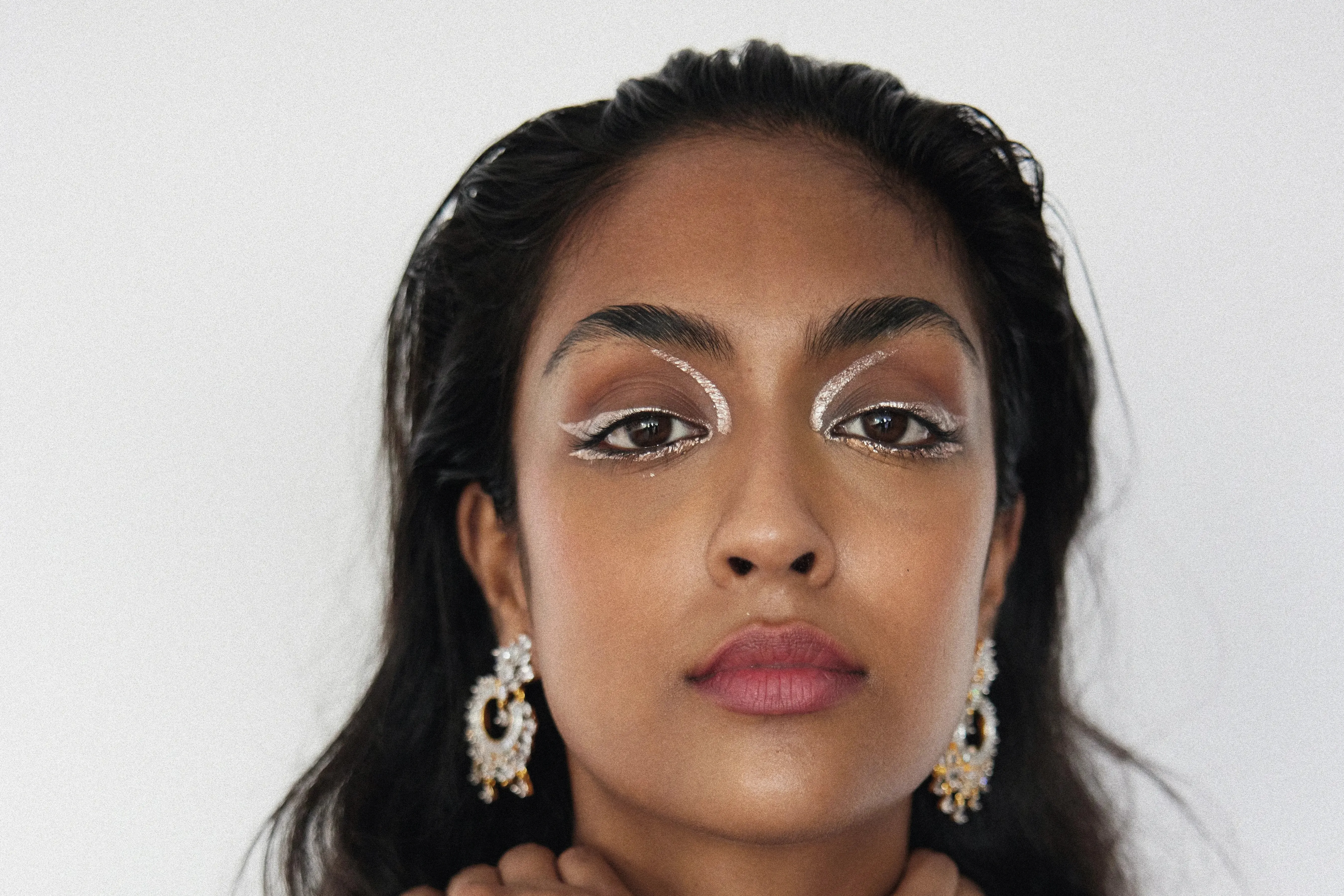 influencer creates edgy makeup looks