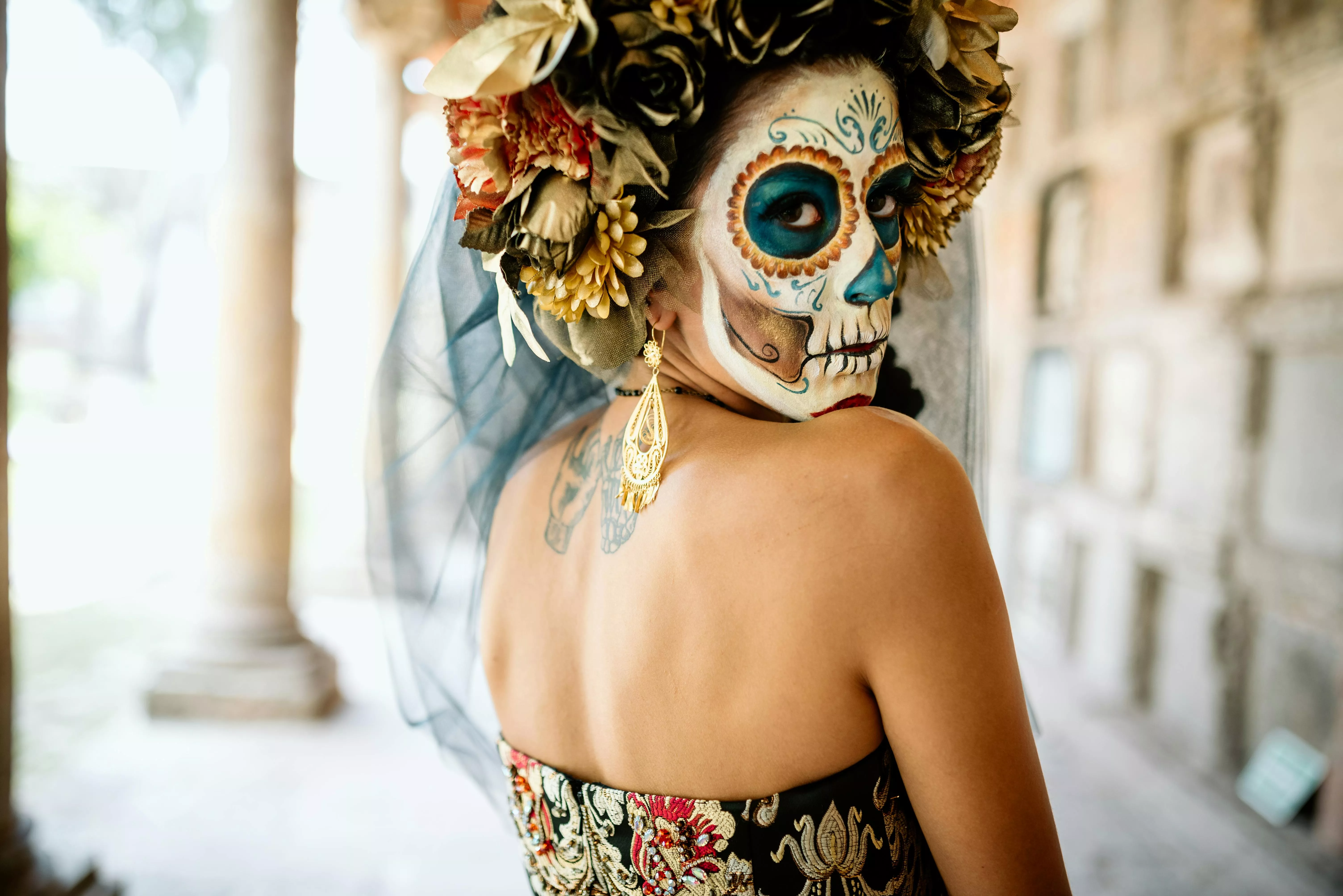 La Calavera Catrina Looking Over Her