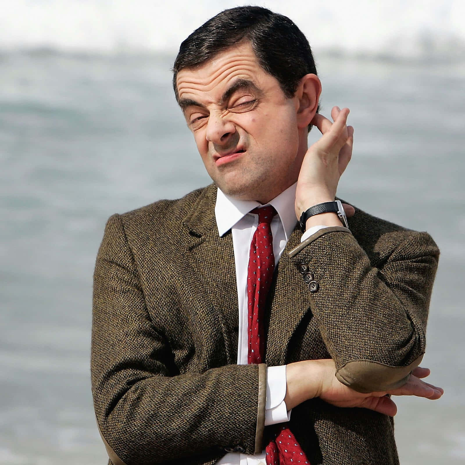 Download Mr. Bean in action, showing his playful and quirky side