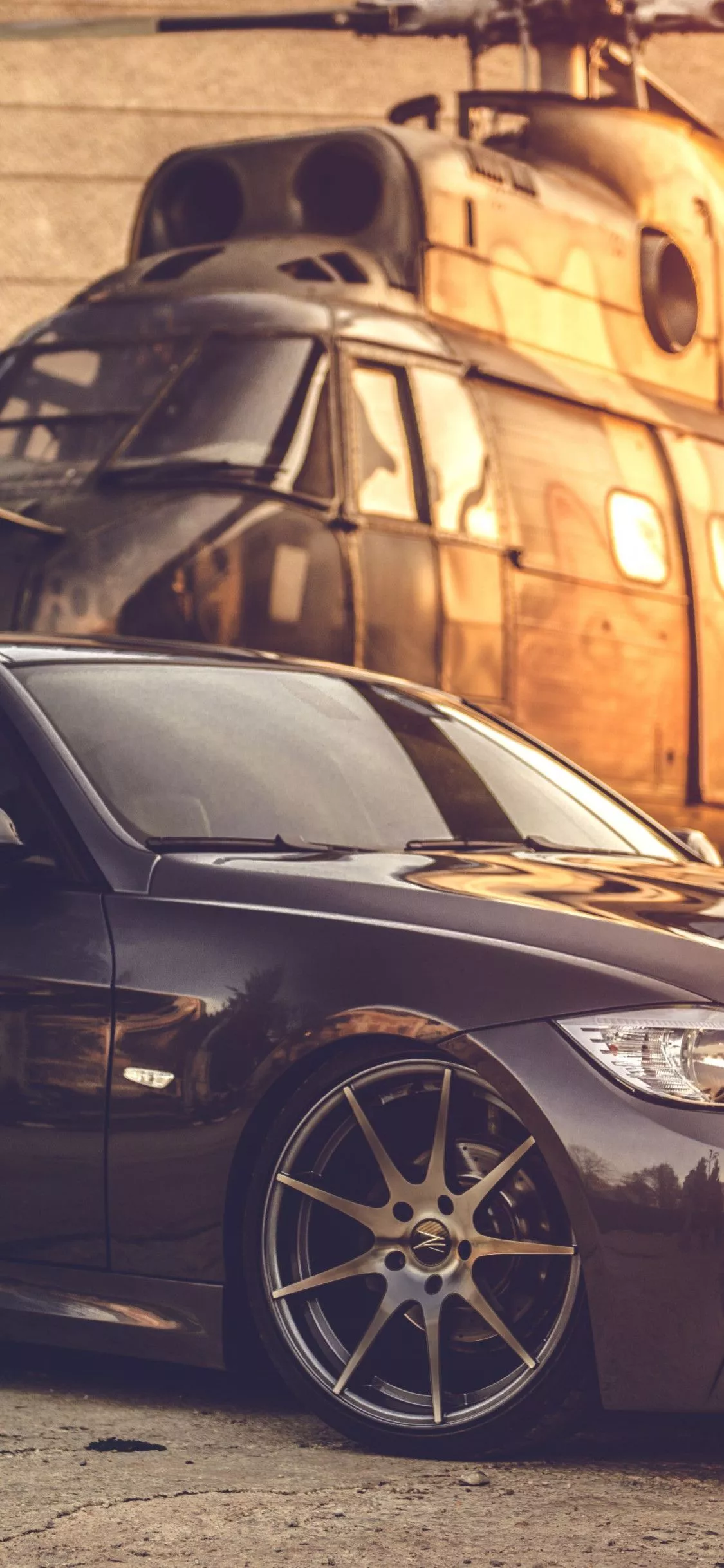 BMW E90 and one helicopter 1125x2436