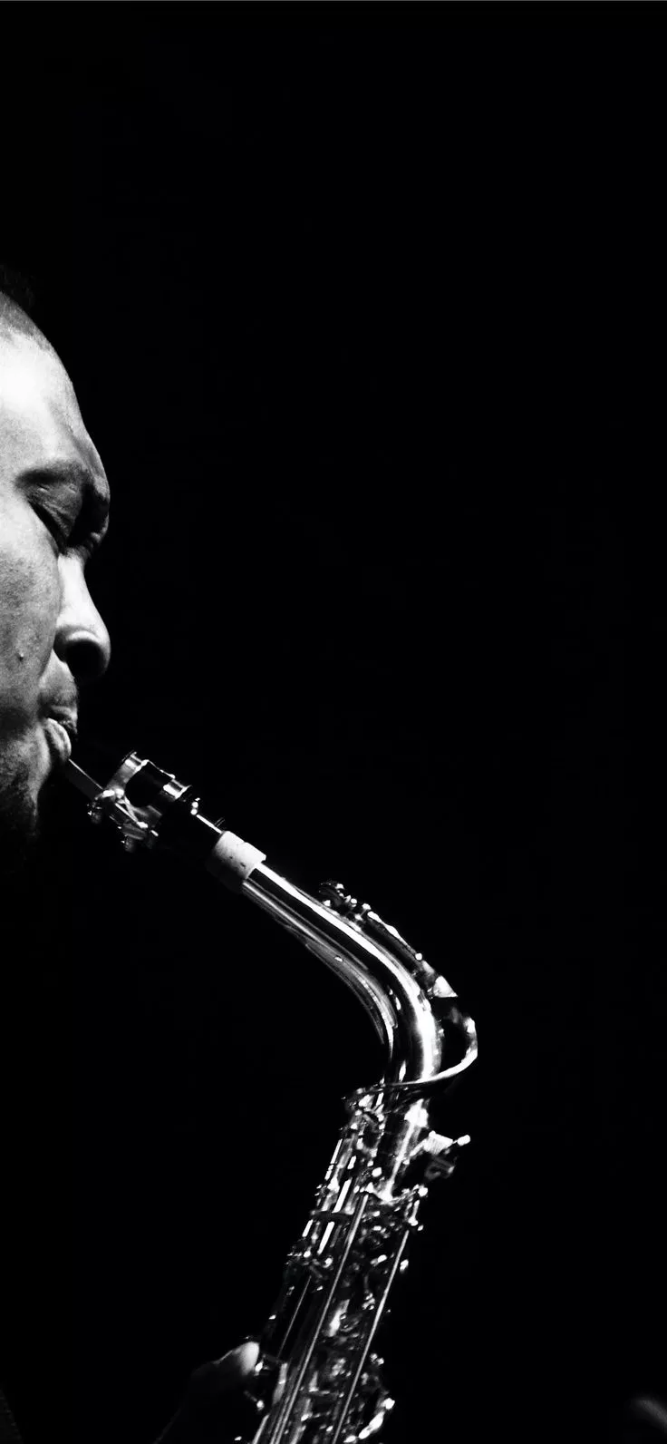 man playing saxophone iPhone 12 Wallpaper