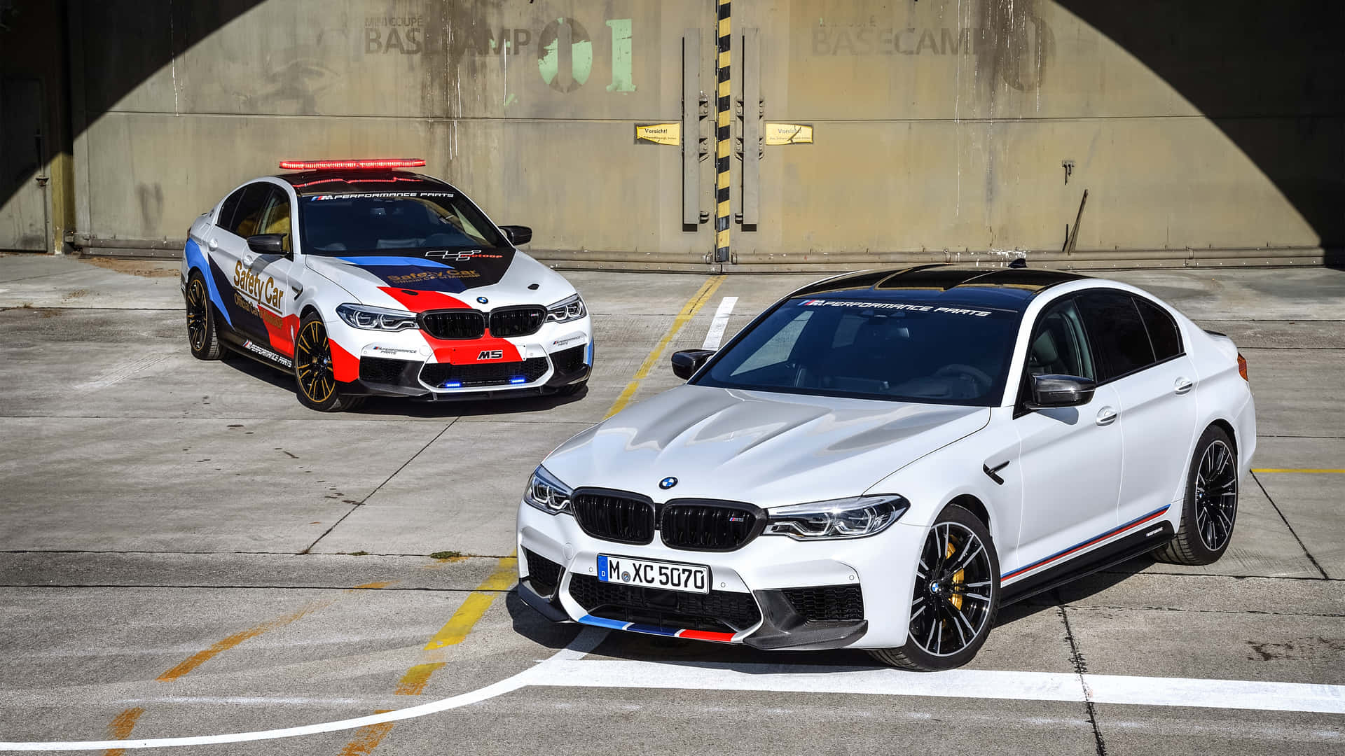 Download Experience the Thrill of Driving a BMW M5 Wallpaper