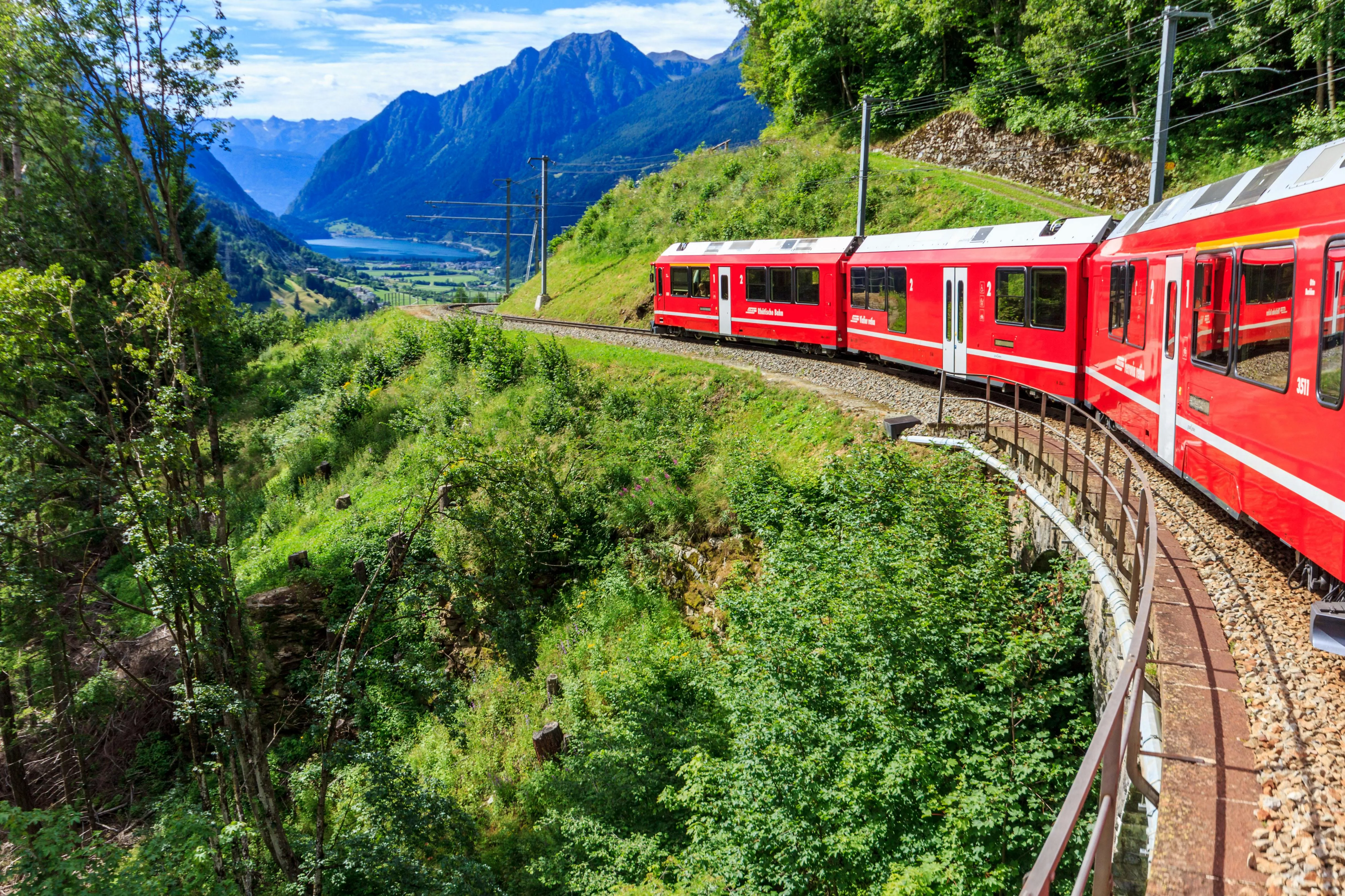 Red Train in Mountains in Switzerland