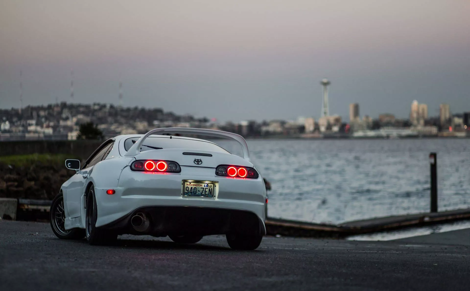 White Toyota Supra Car Near Bay