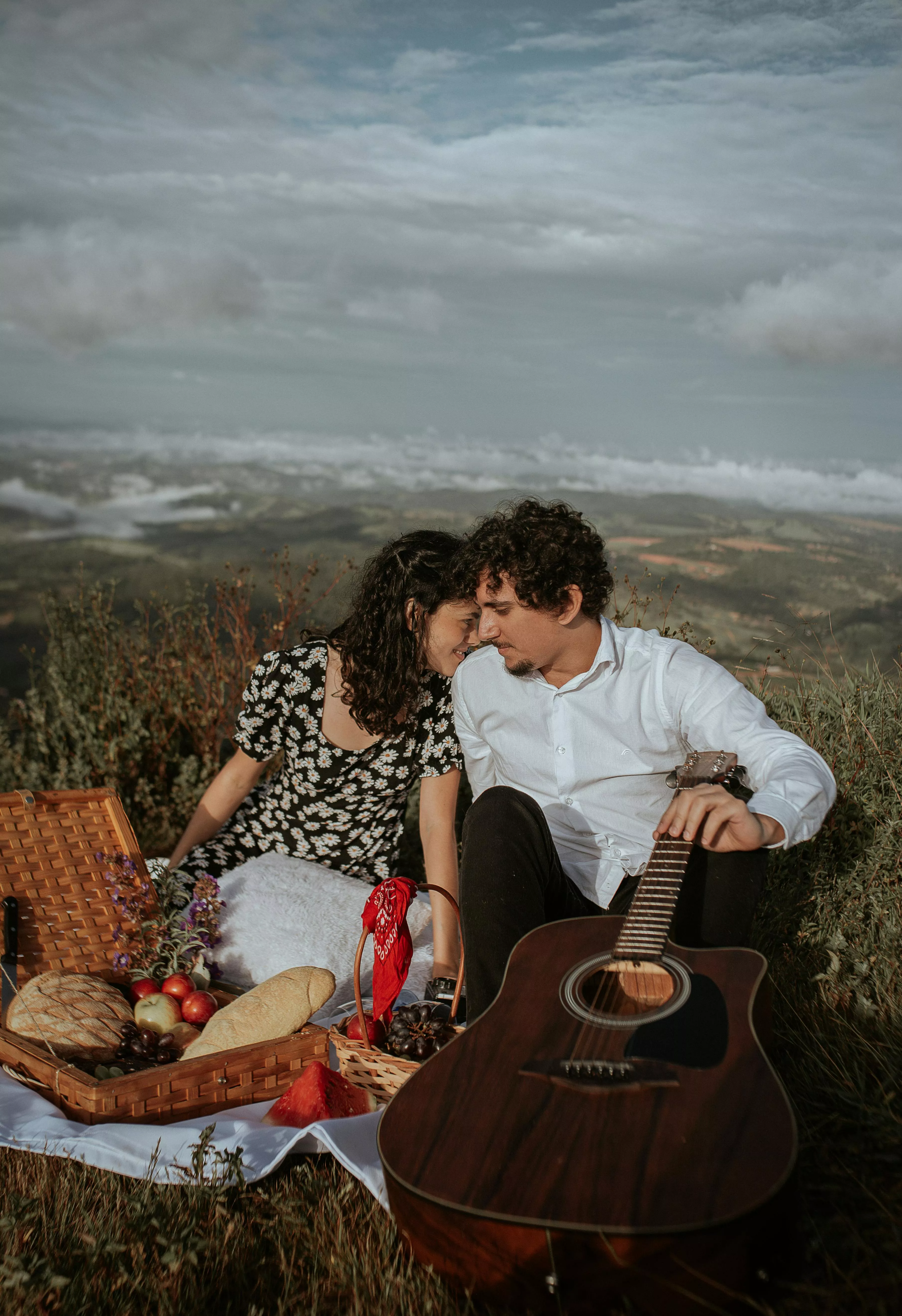 Romantic couple sitting in nature
