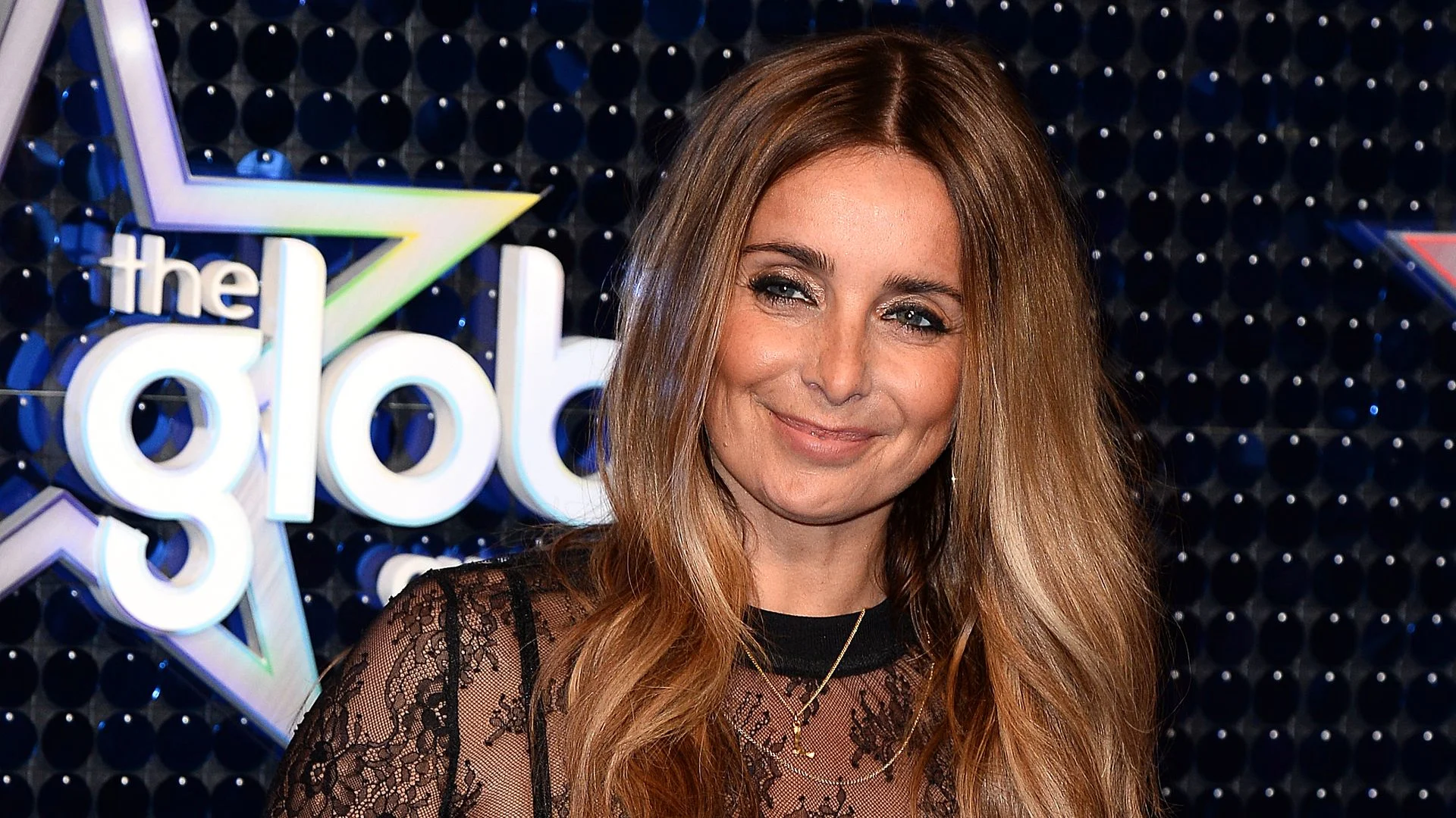 Louise Redknapp is gorgeous in lacy