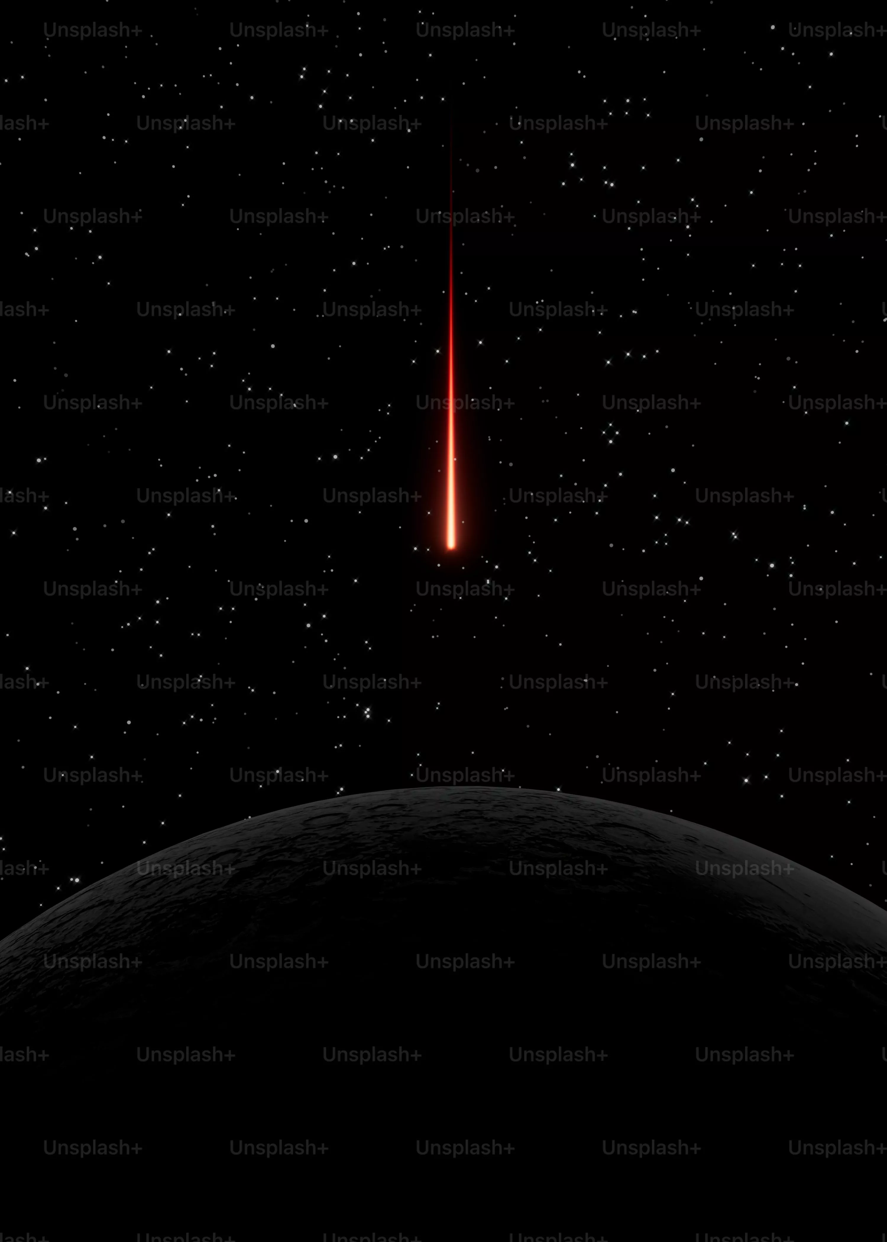 A red light shines in the sky above a