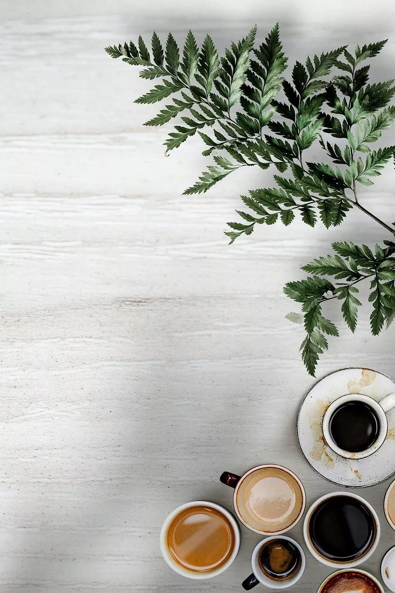 image of Mixed coffee cups with a leaf