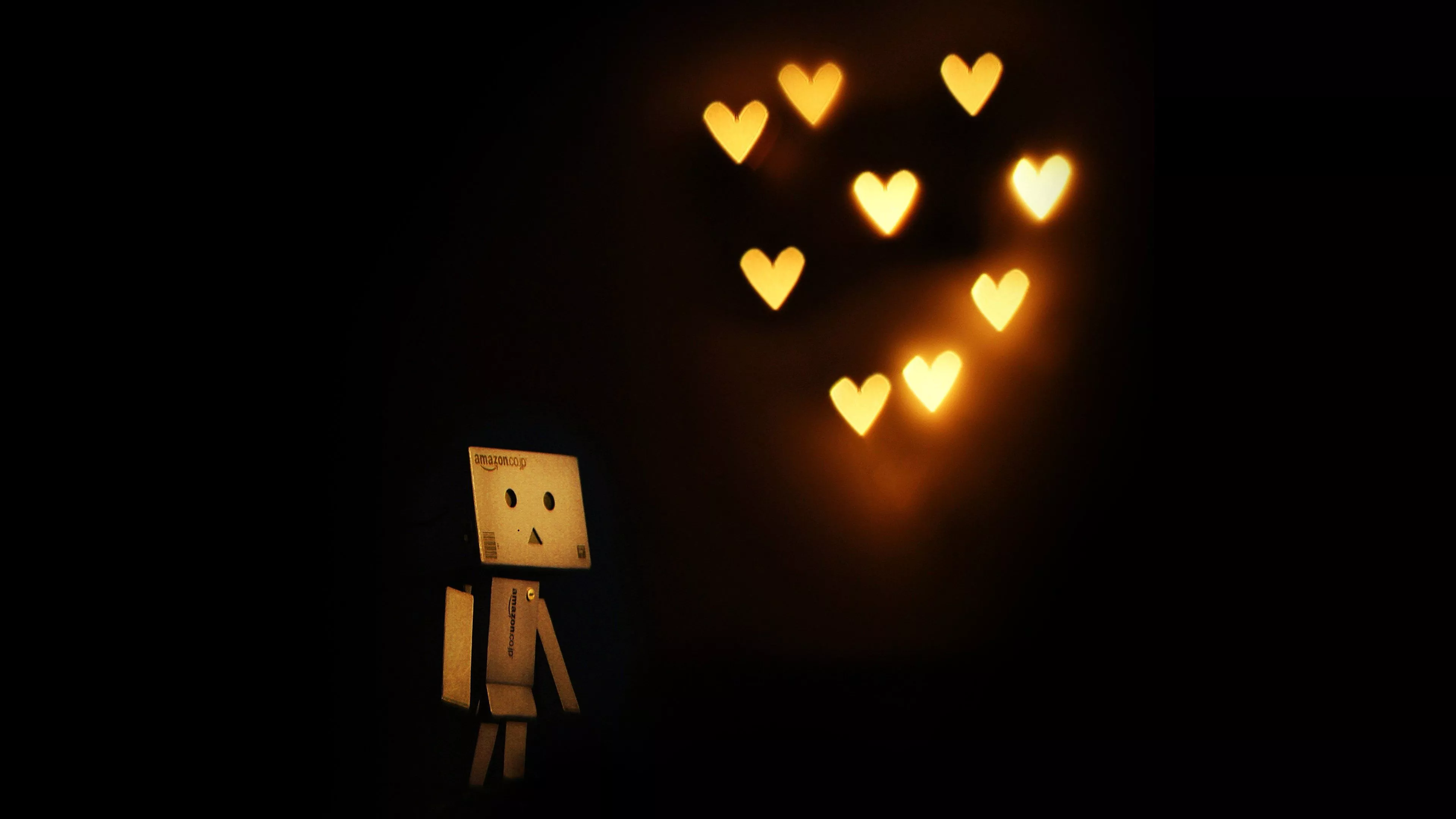 Hearts With Lights And Robot Toy With Black Background 4K HD I Love Wallpaper