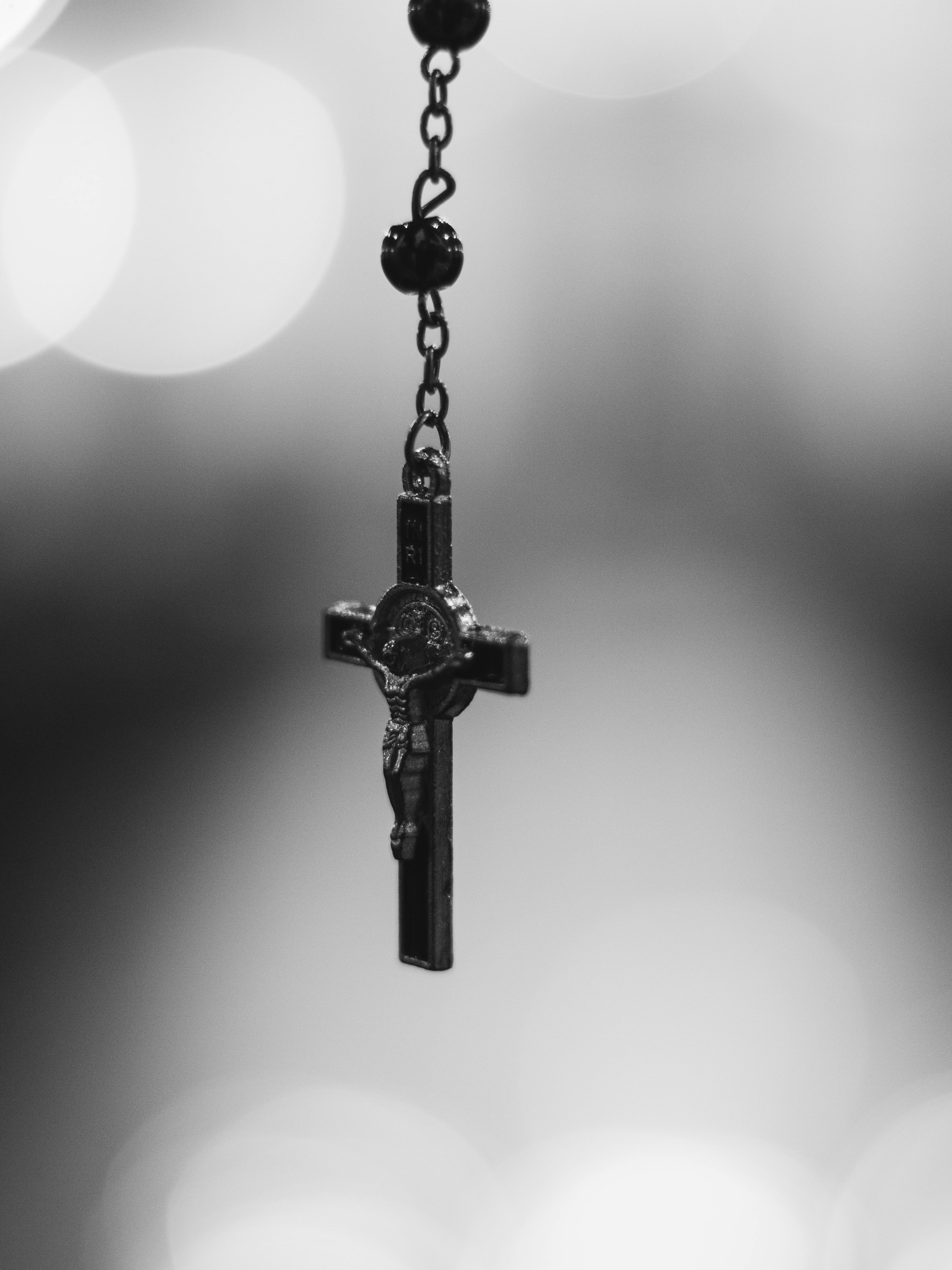 Close Up Of A Cross On A Rosary · Free