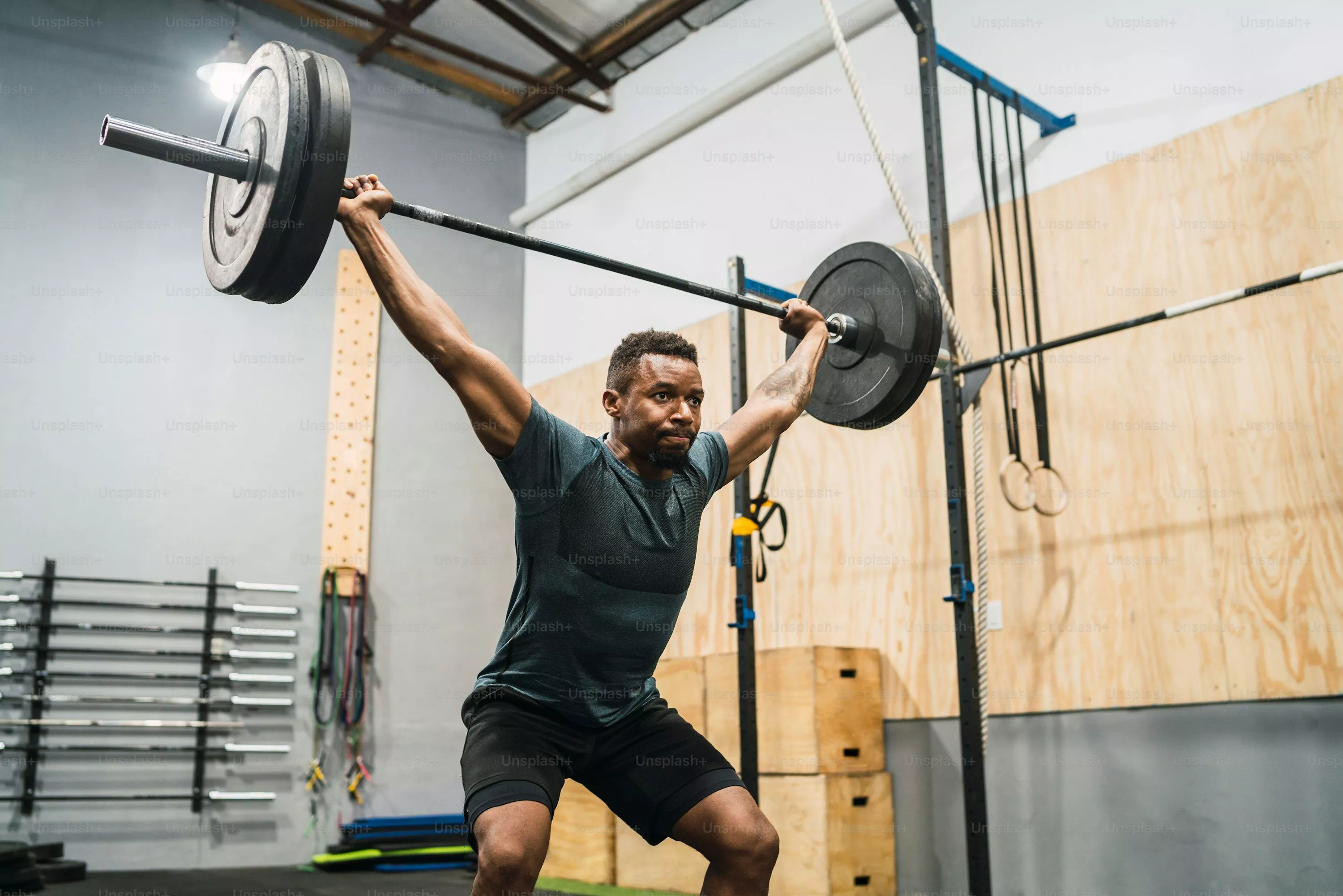 Man Lifting Weights Picture. Download