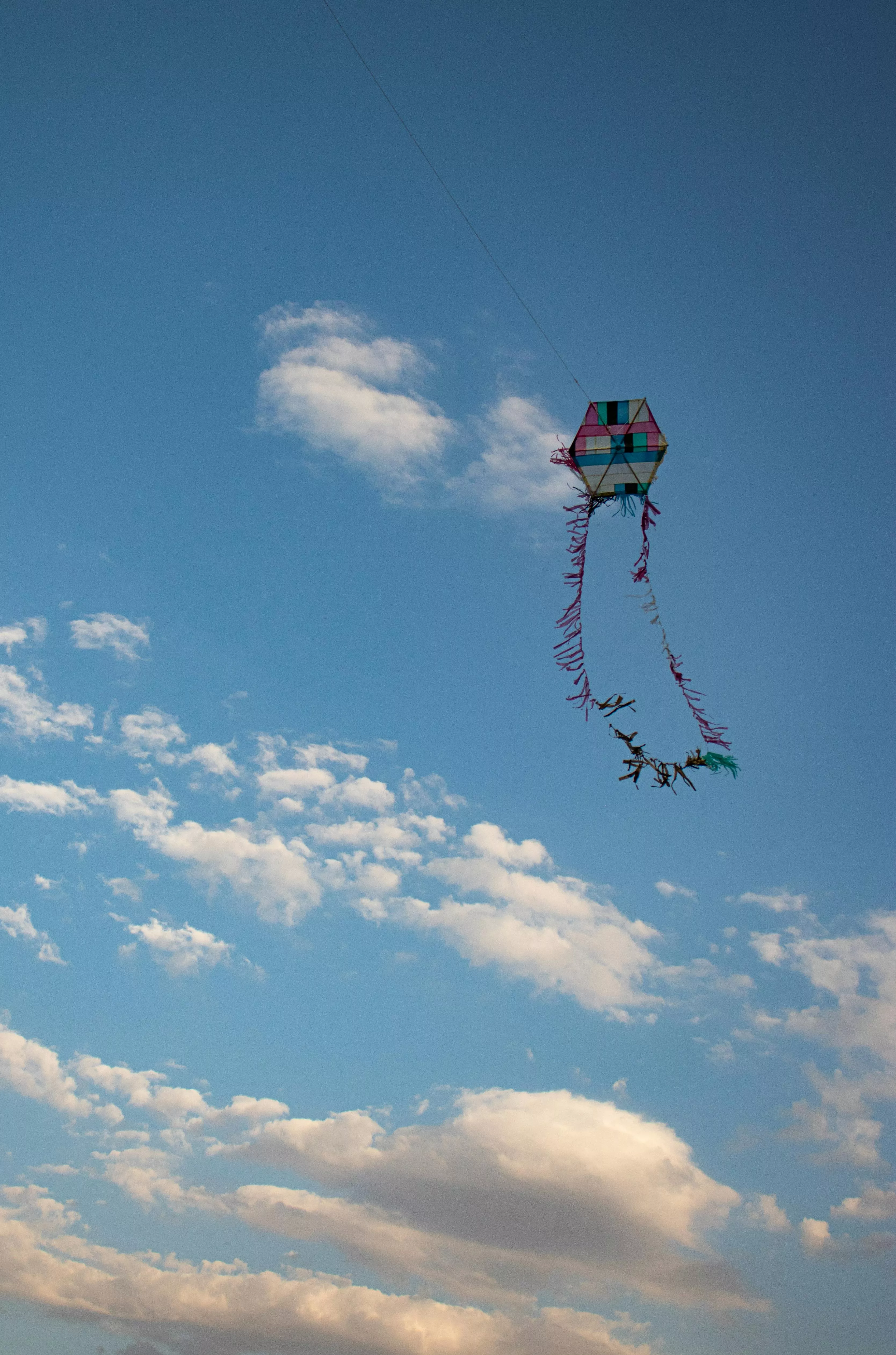 A Kite Flying Under a Blue Sky · Free