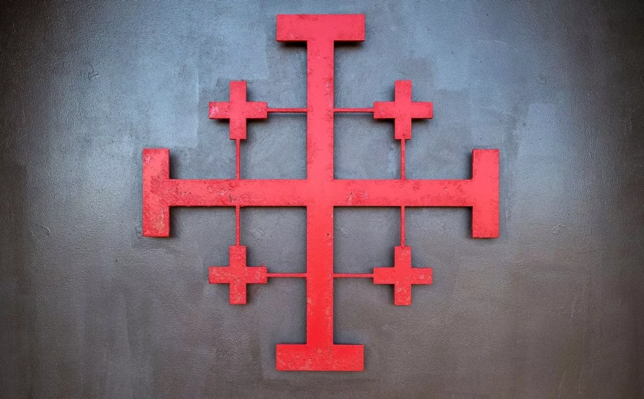 Cross symbol on the wall of St. John