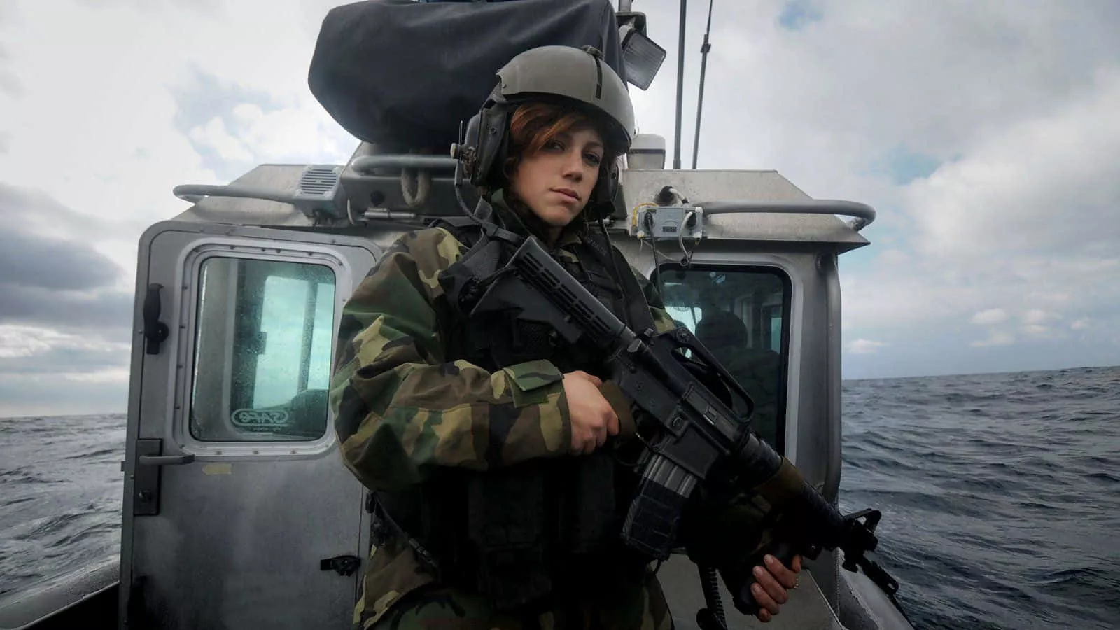 Download Woman Holding Gun Uniform On