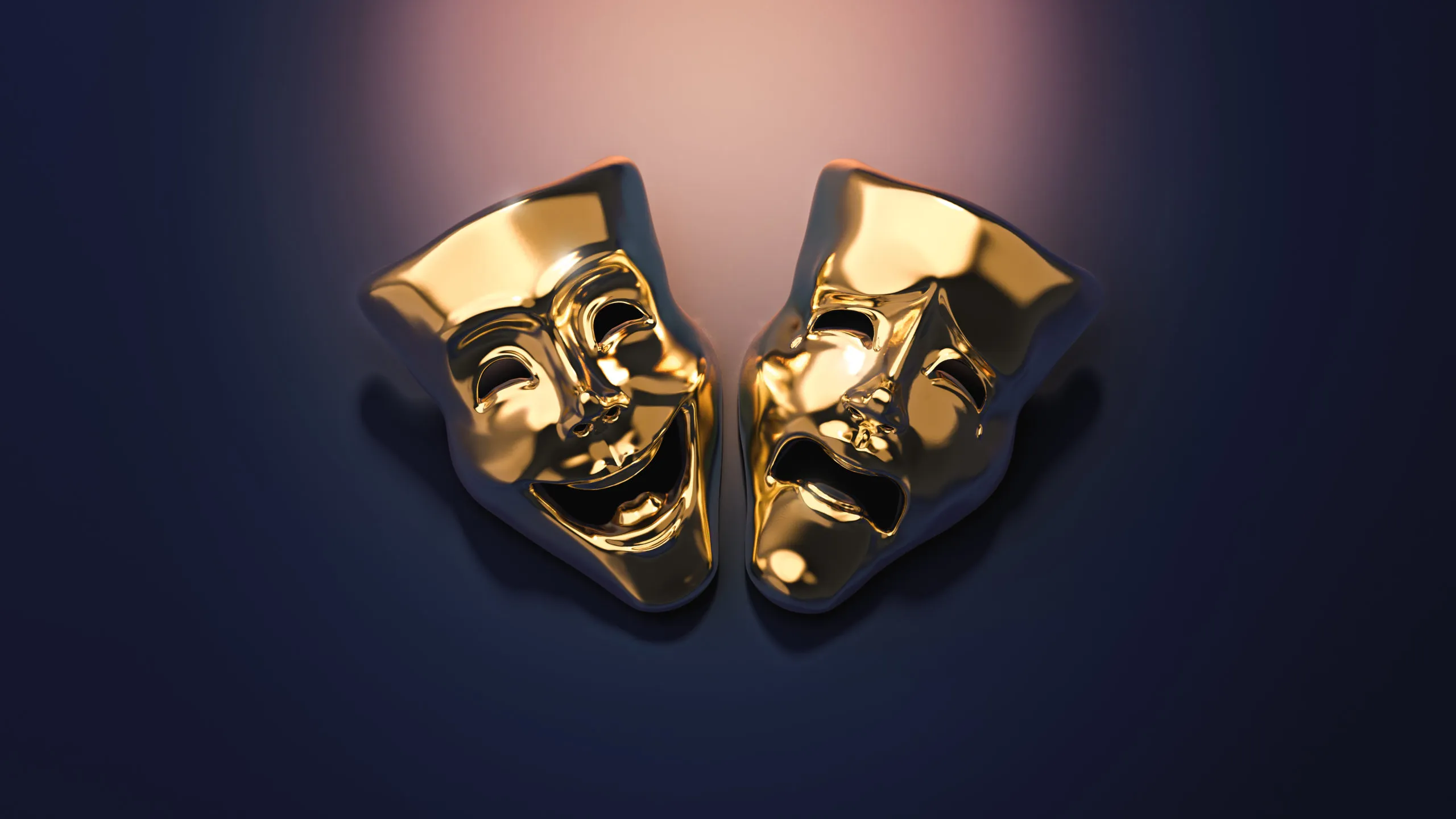 Golden theater masks of drama