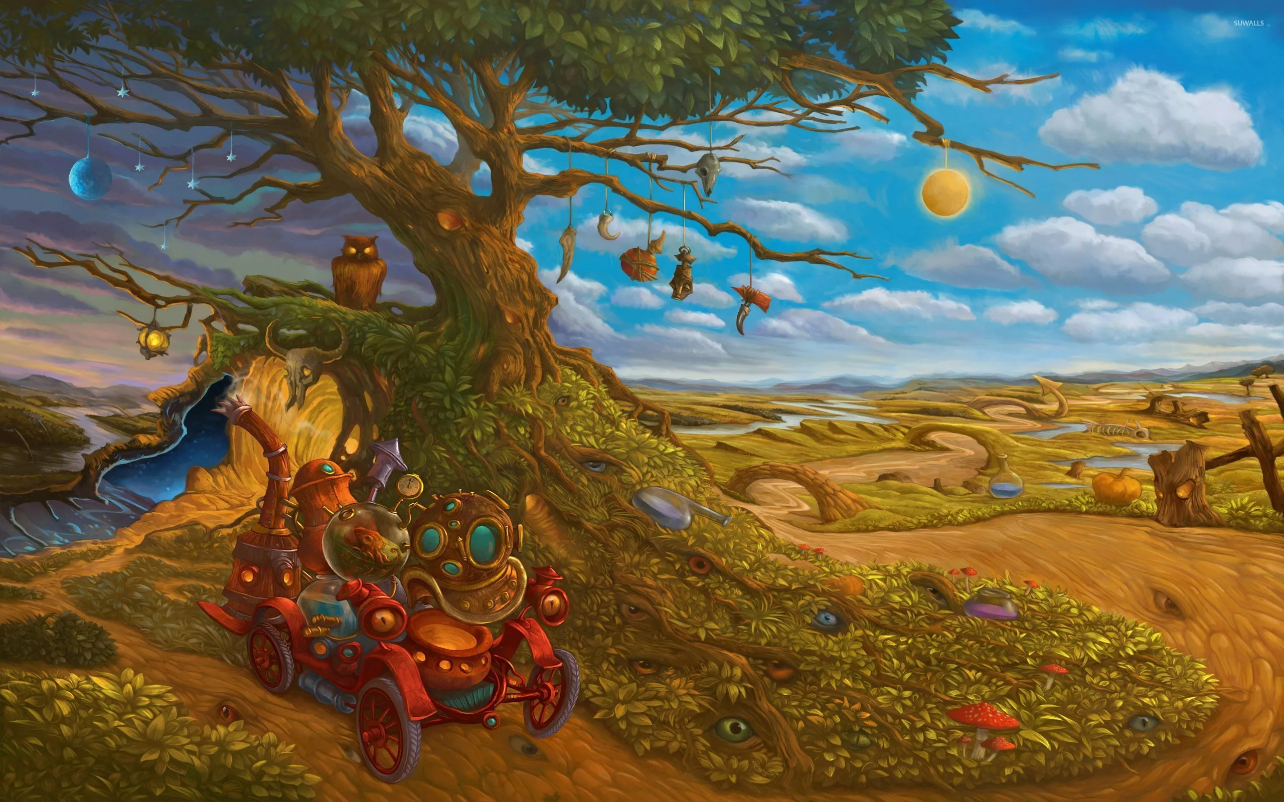 Sun and moon hung in a tree wallpaper