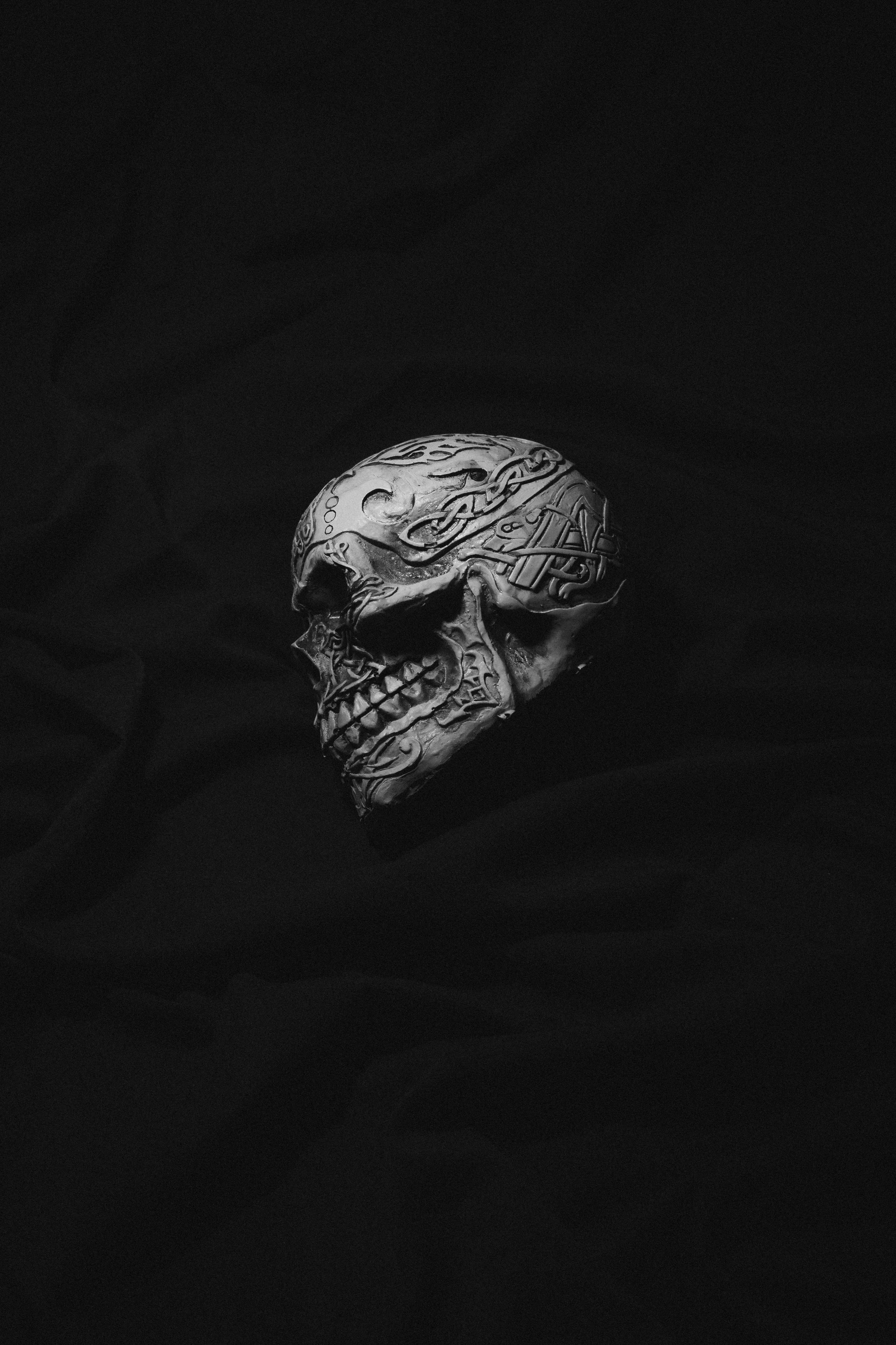 Iron Skull on Black Background · Free