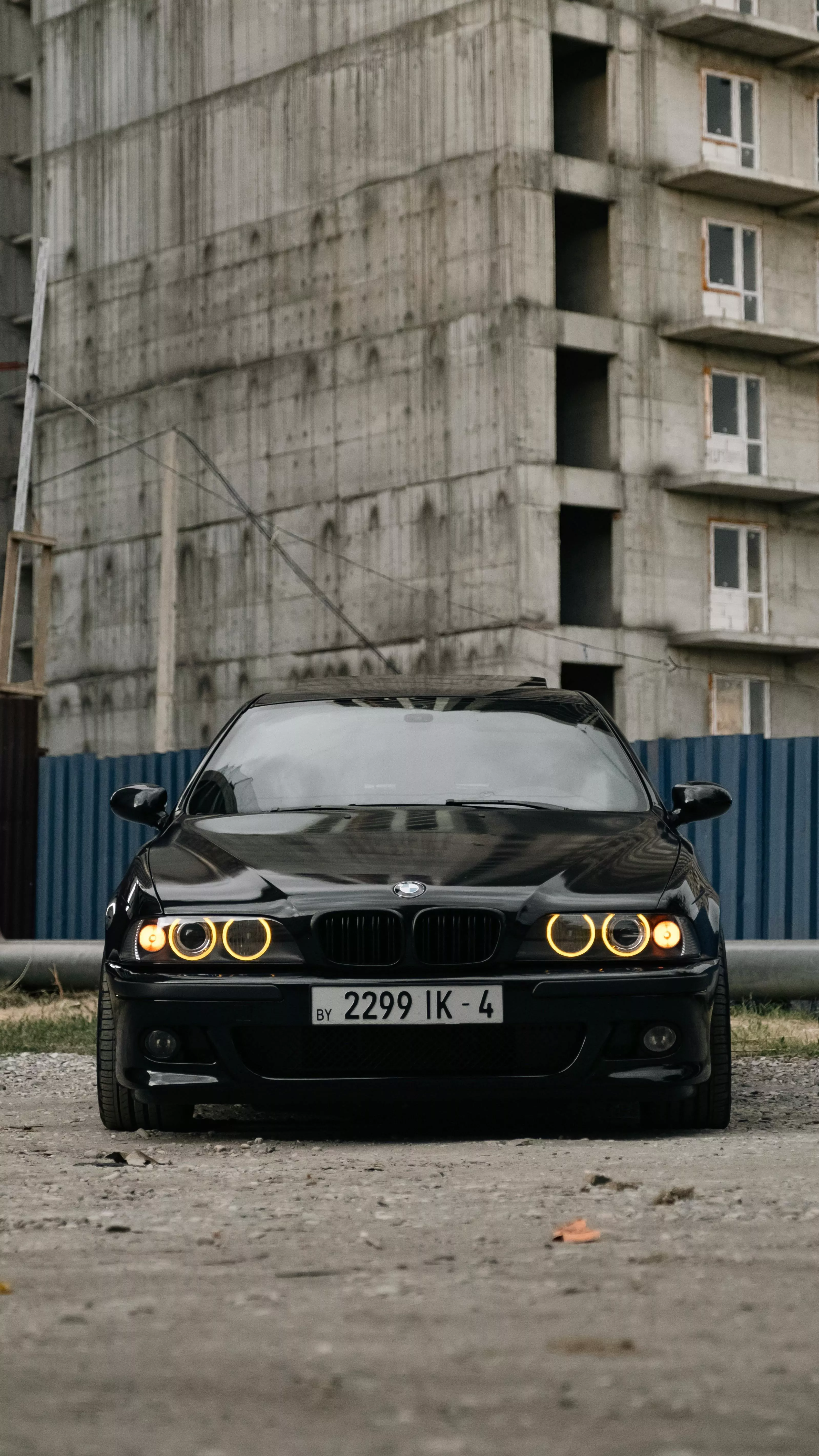 BMW E39 Parked Next to the Construction