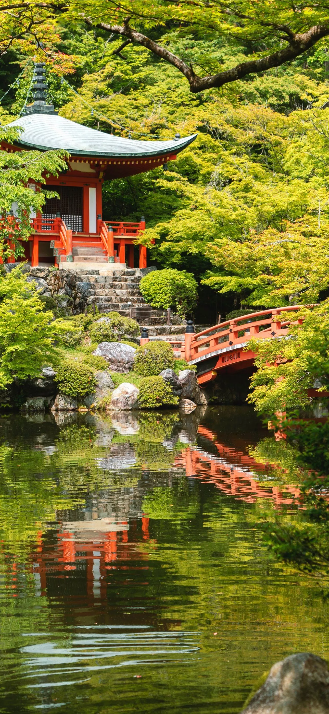 red temple near body of water iPhone