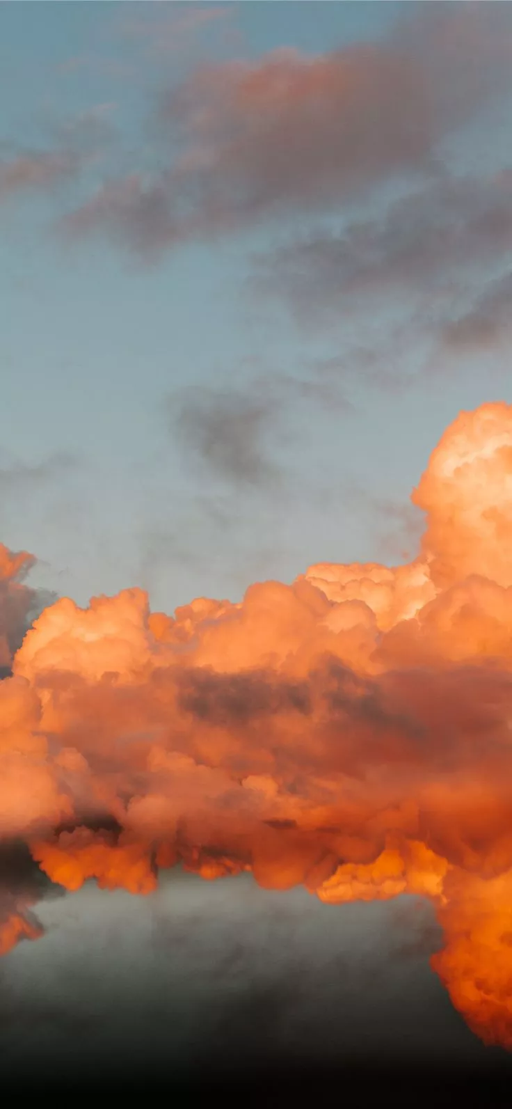 orange and blue cloudy sky iPhone X
