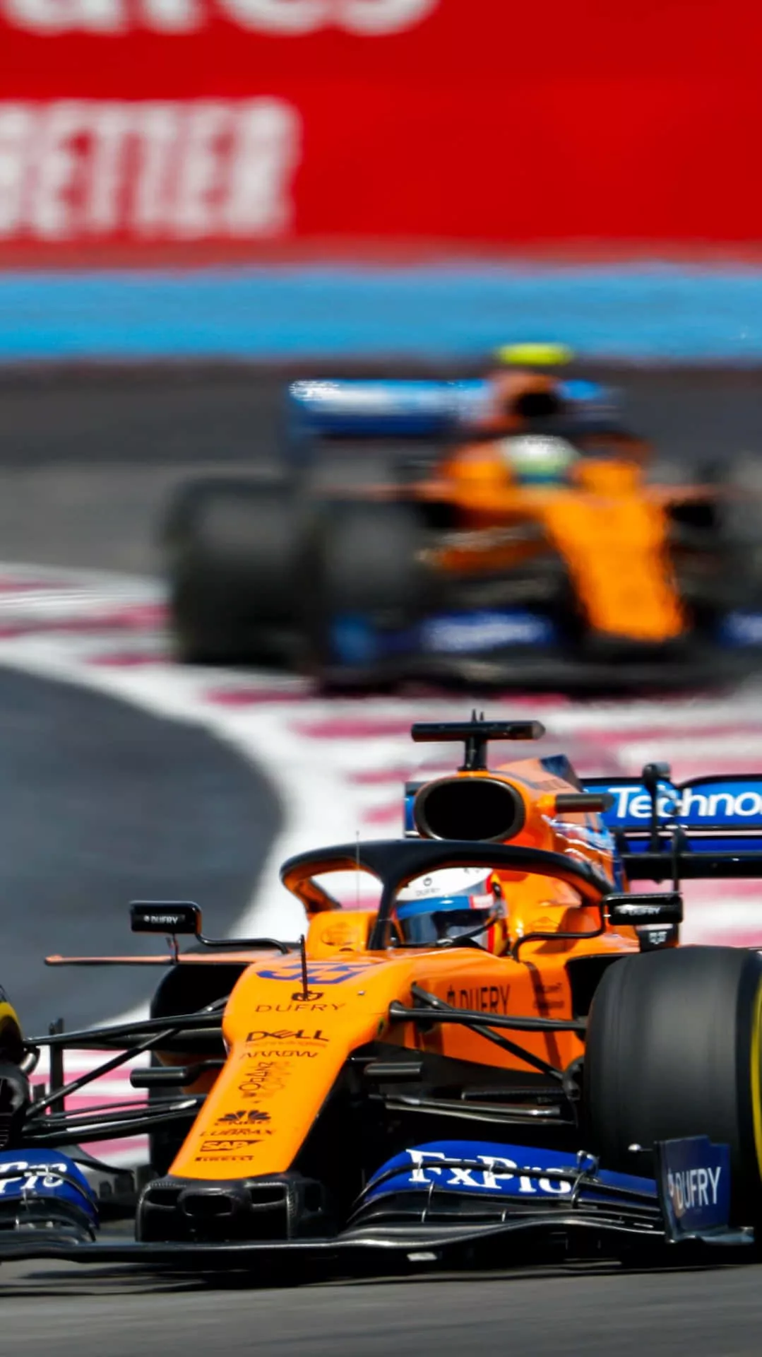 Blue Racing Car On A Track Wallpaper