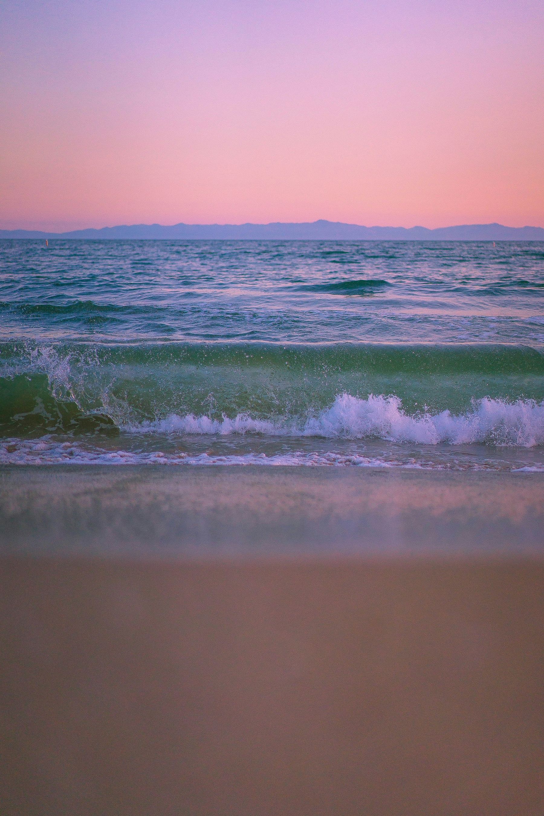 Pink Hues Sunset At Beach
