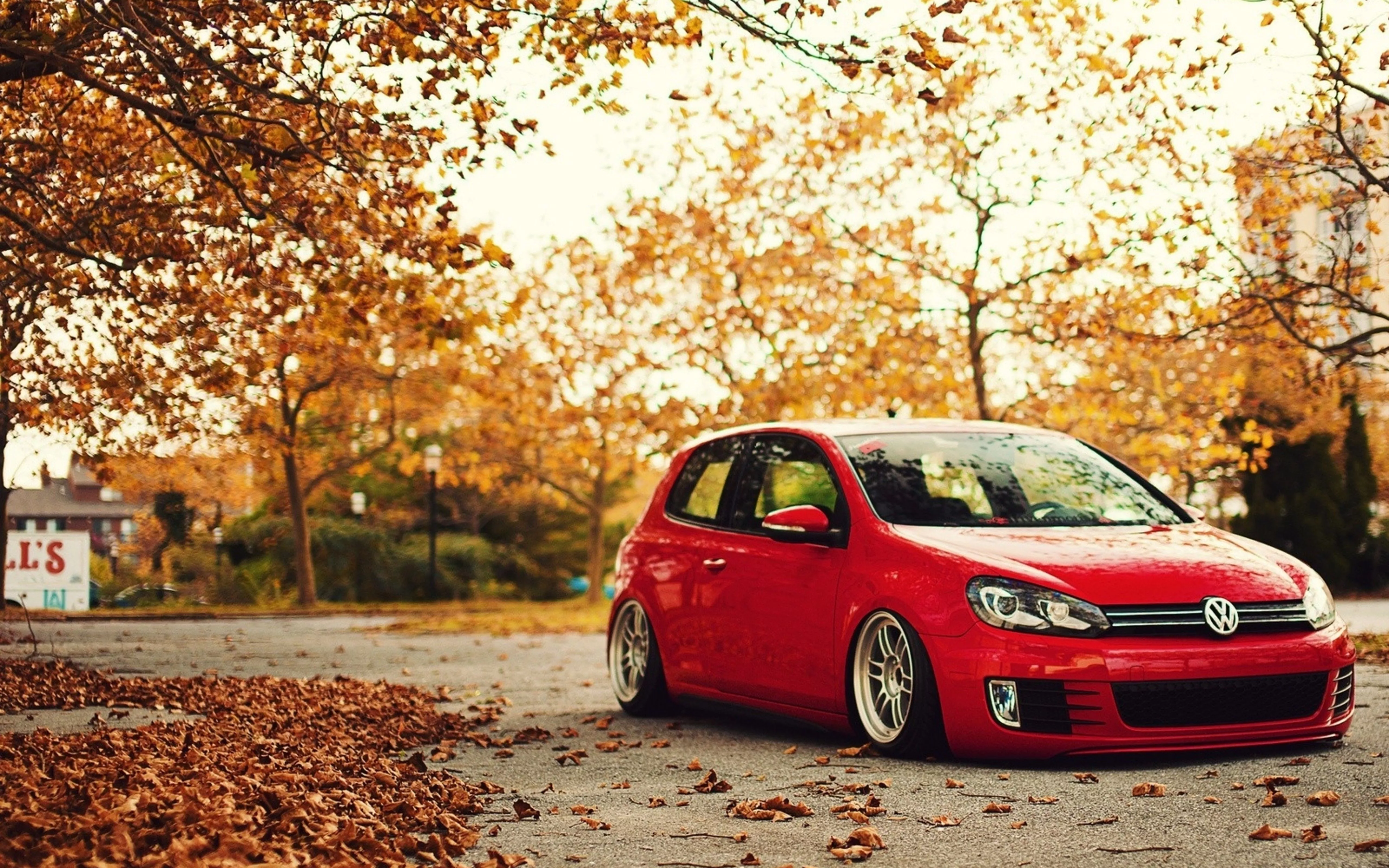 Red Volkswagen 5 Door Hatchback