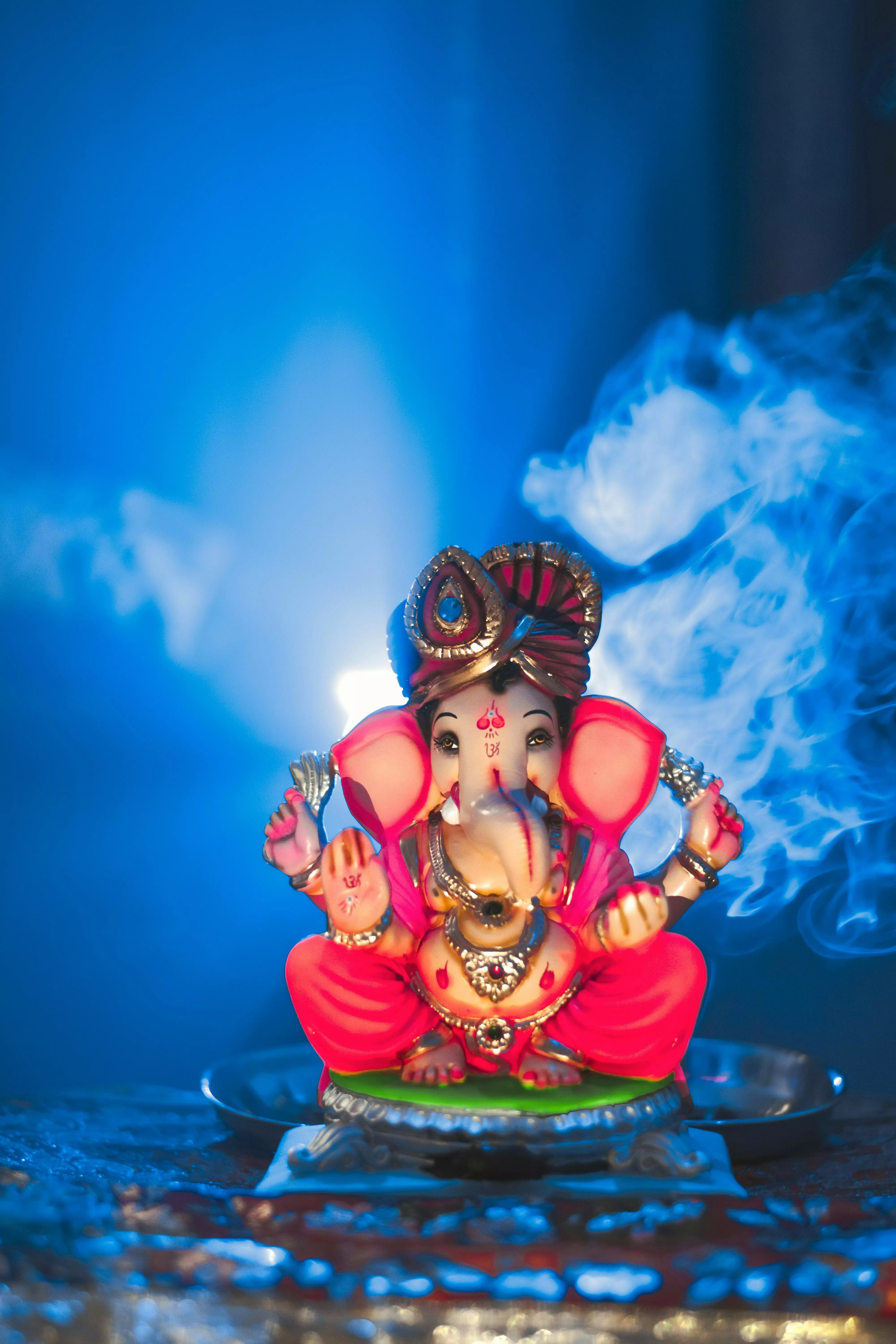 A Ganapati Statue in Pink Color · Free