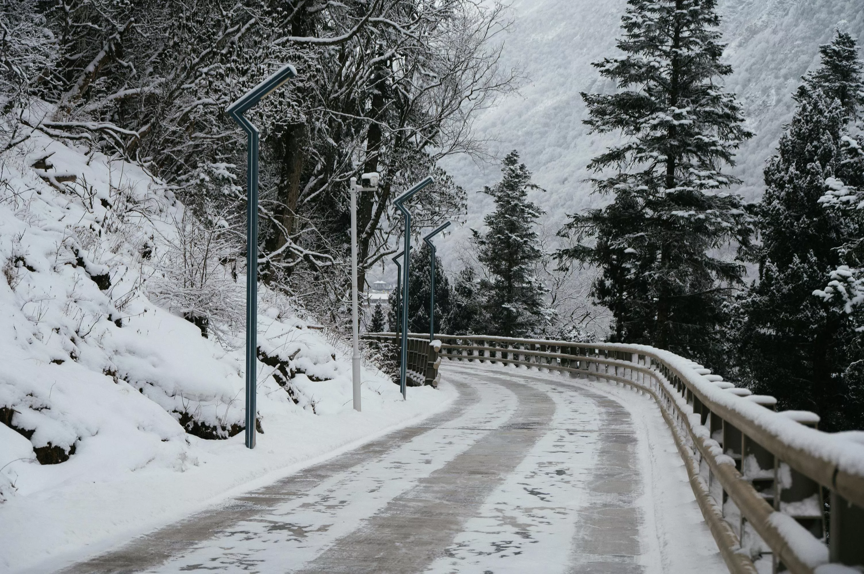 Night Winter Road with Light in End