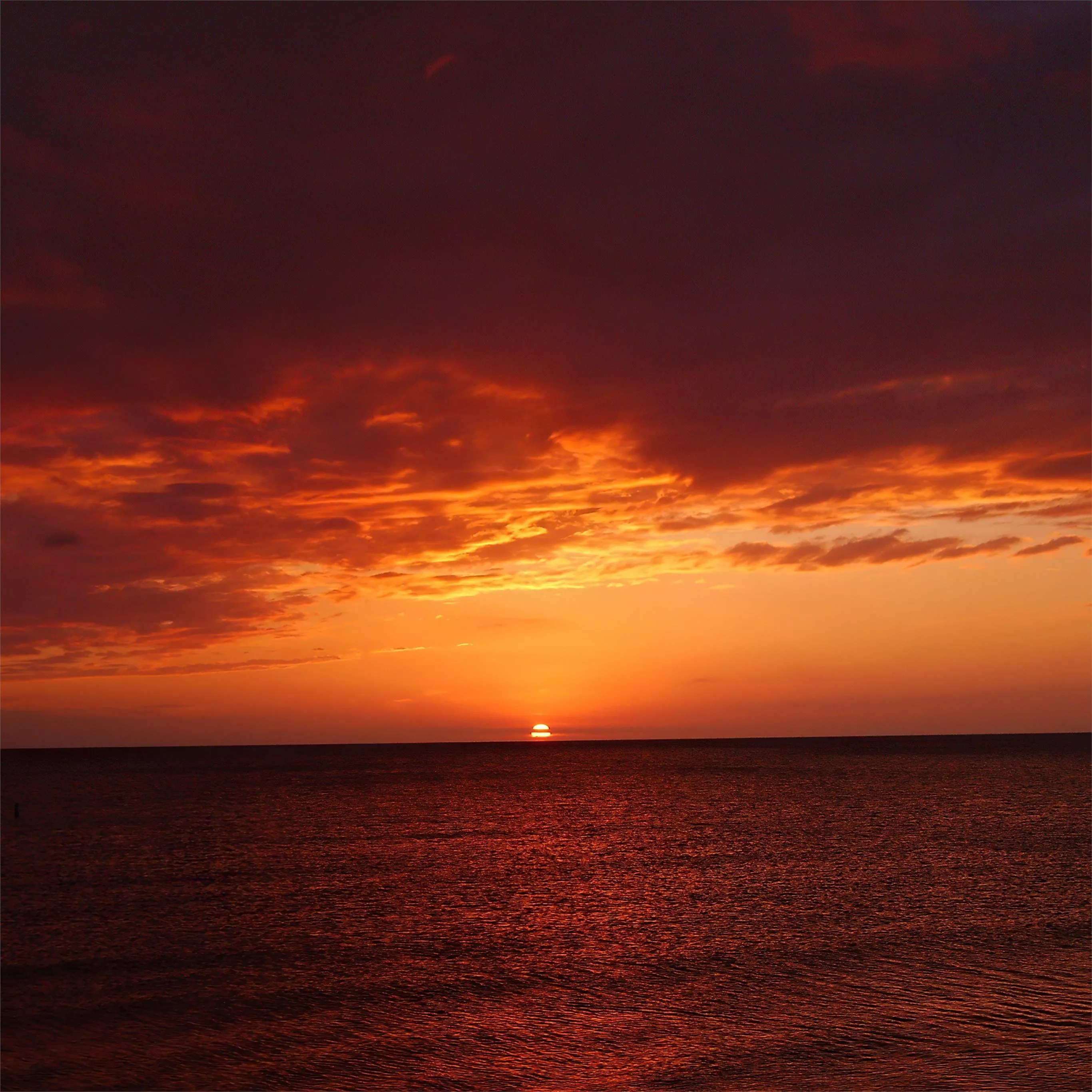 orange sky sunset sea 4k iPad