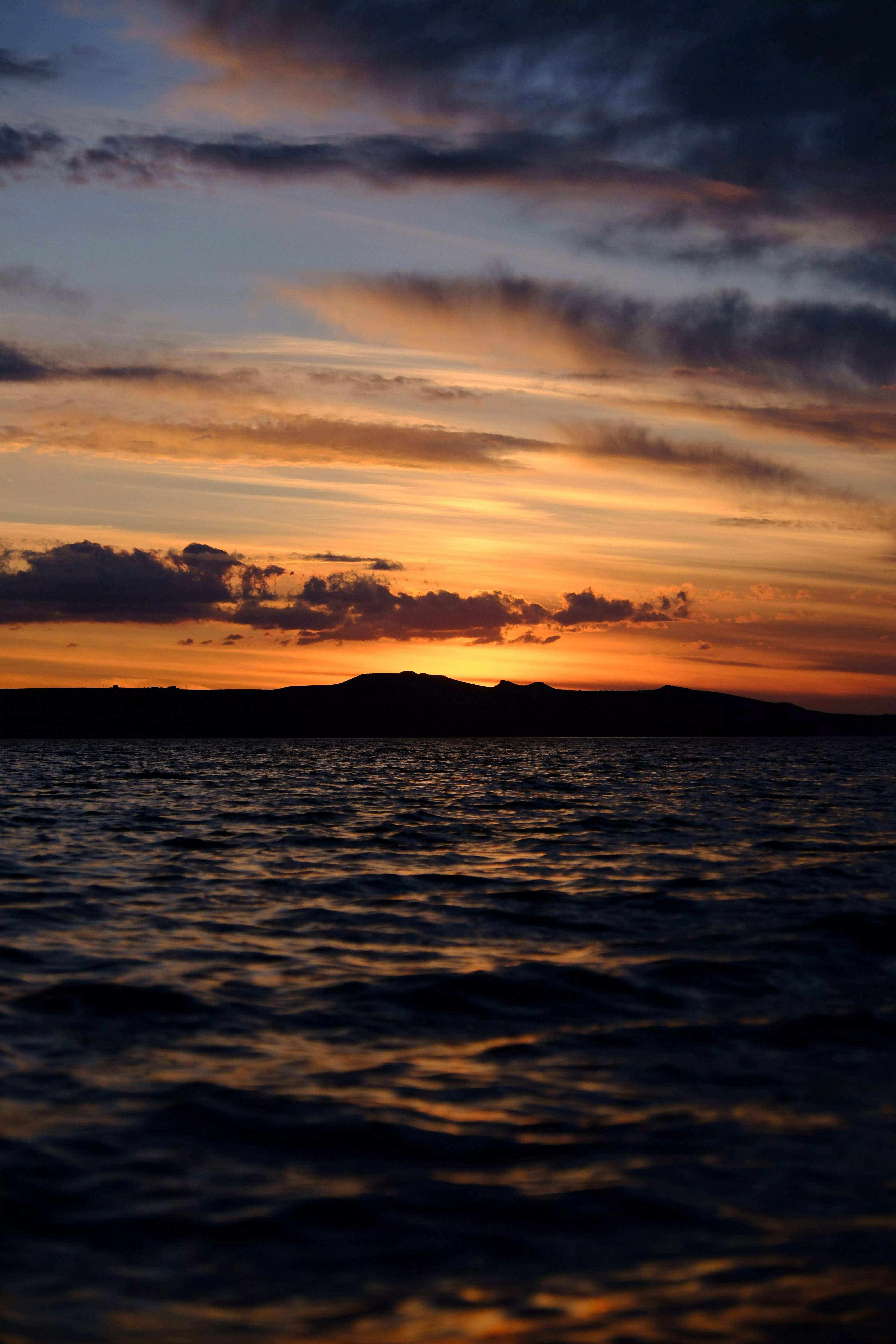 Sunset Behind the Mountains on