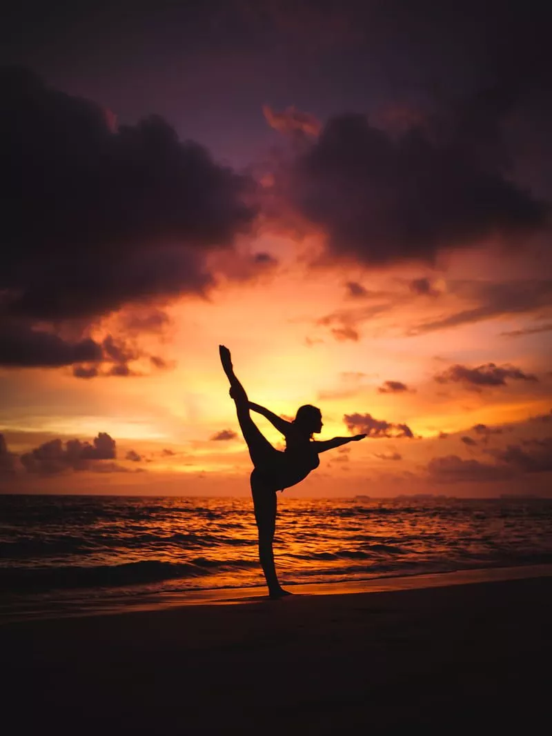 Silhouette graphy of woman stretching