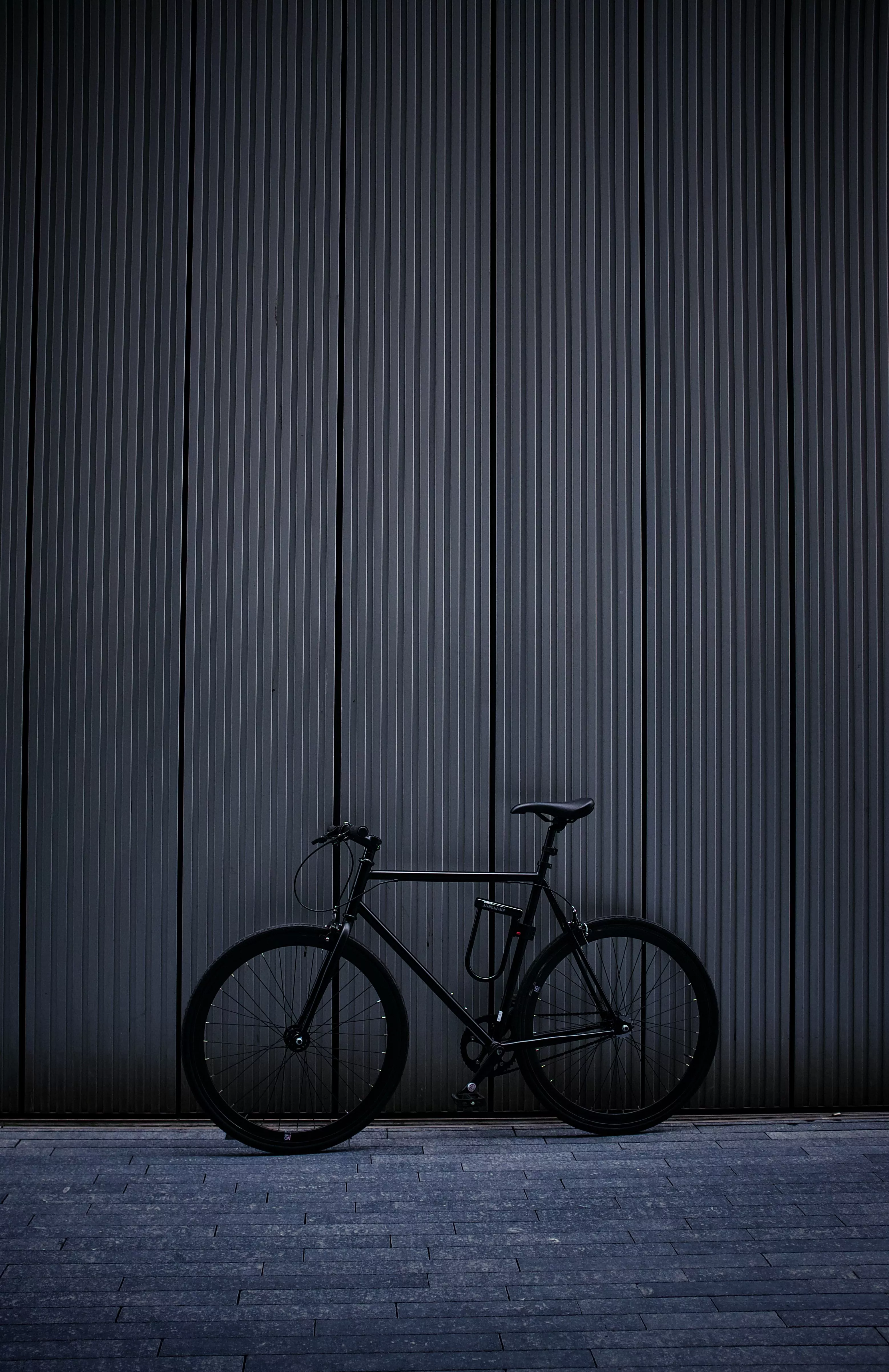 Black Bicycle on a Dark Background