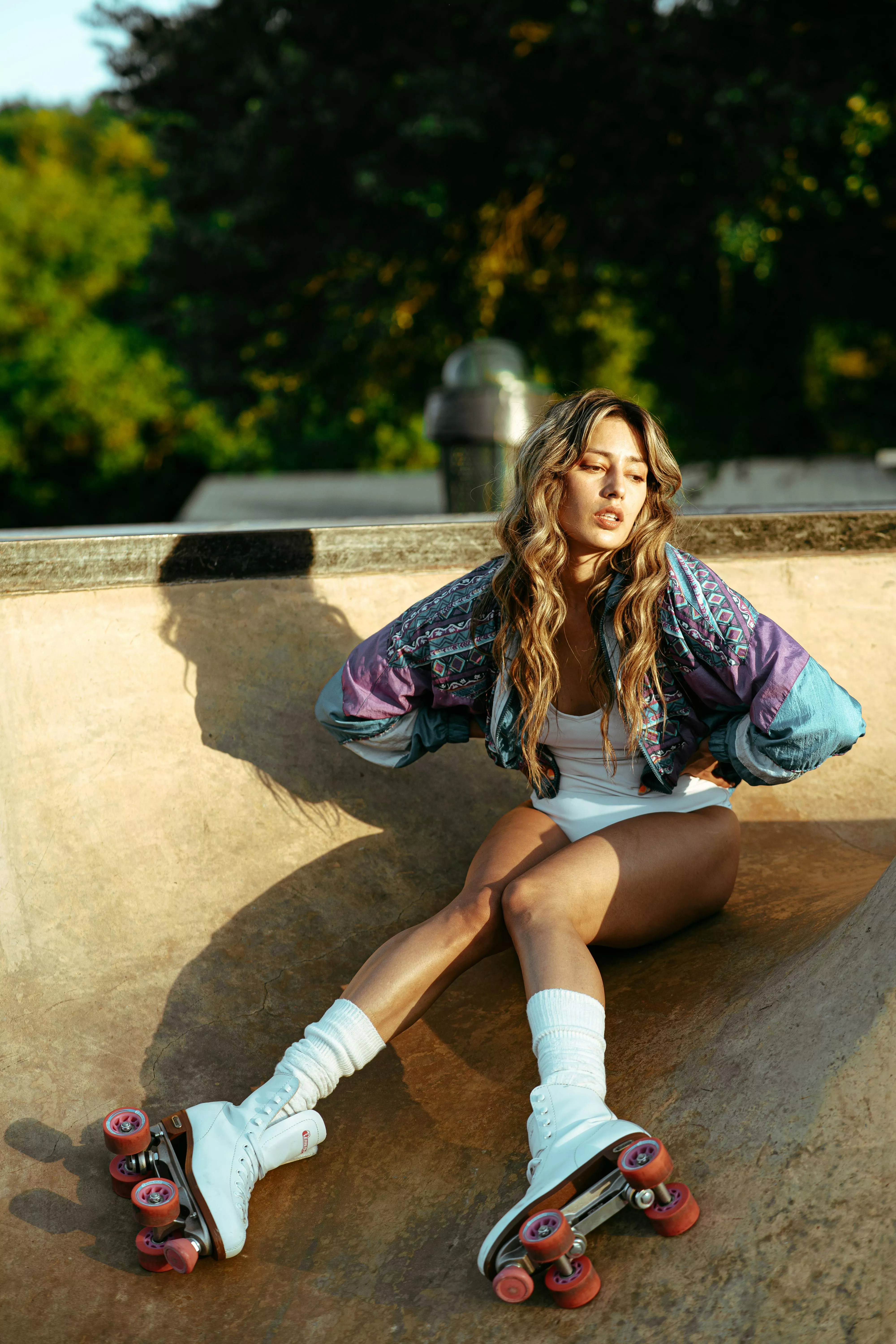 White Bodysuit Sitting on a Skate Ramp