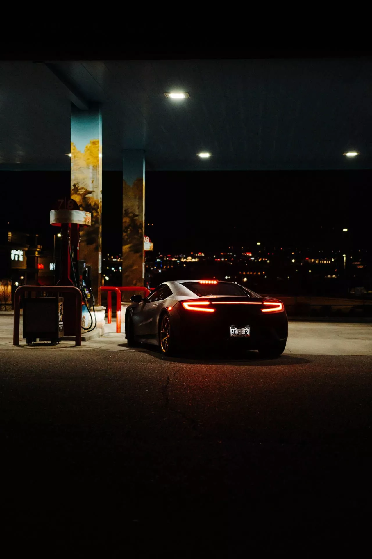 Luxury Car In Gas Station Wallpaper