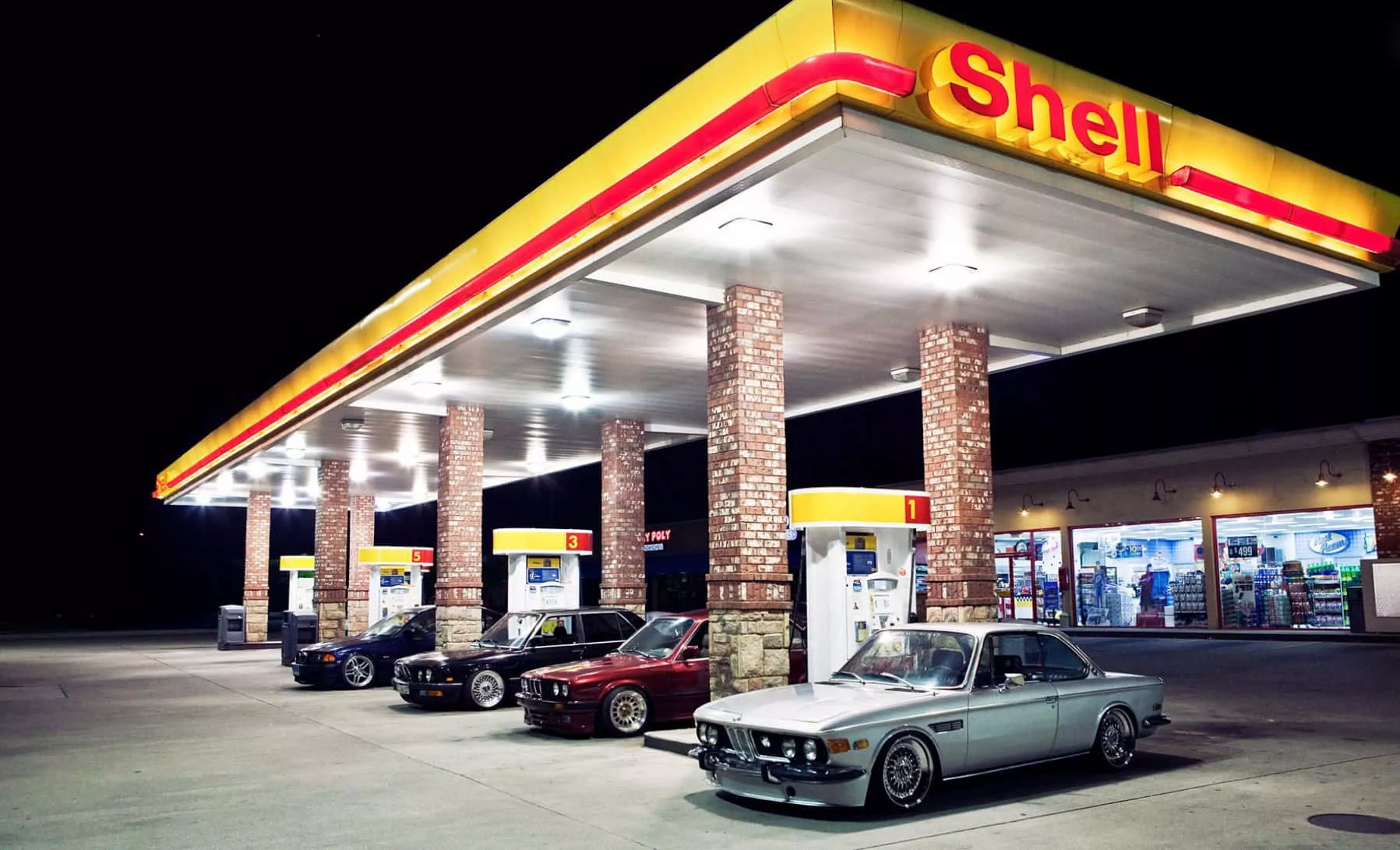 Download A Gas Station With Cars Parked