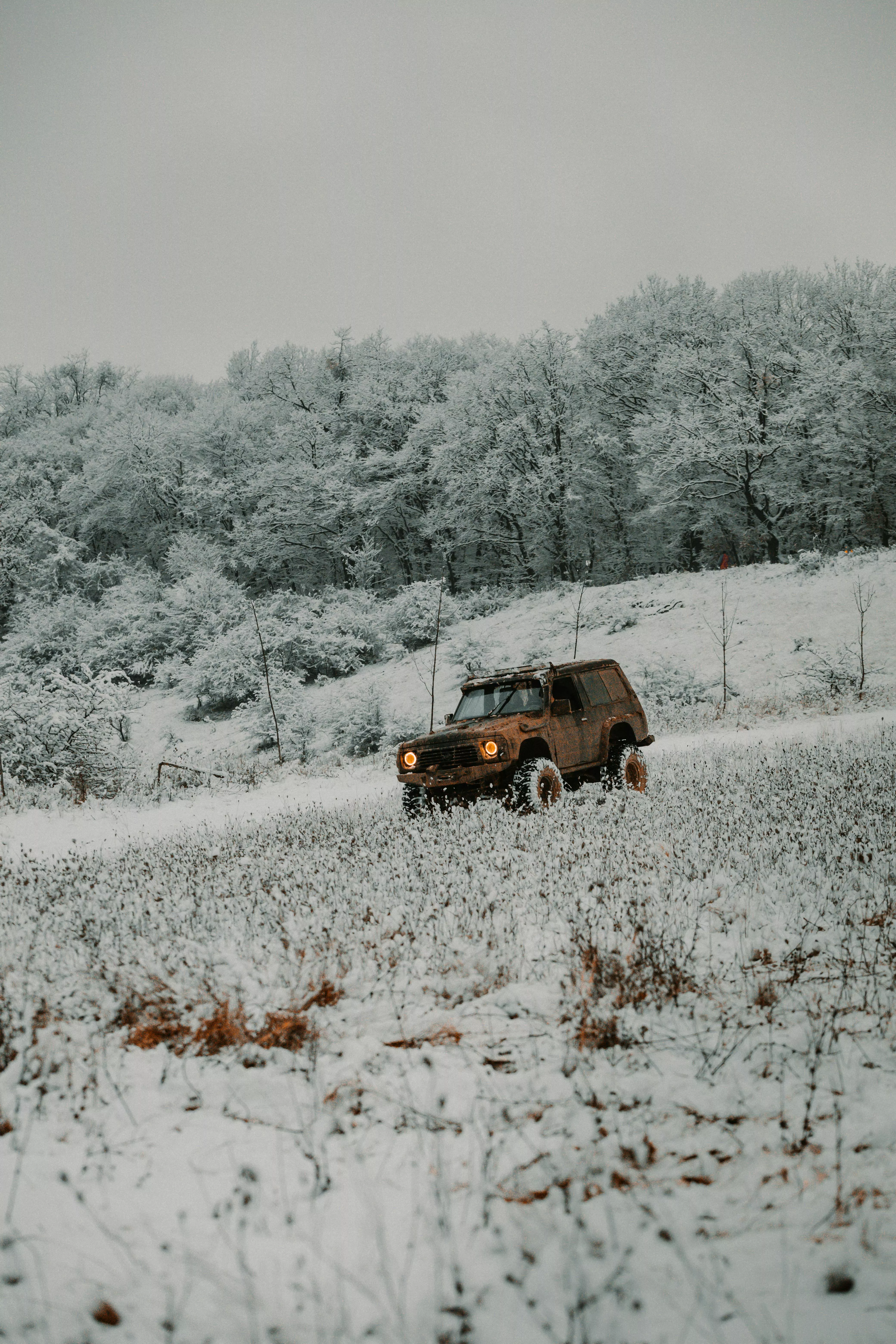 Black SUV Car on the Road in Winter