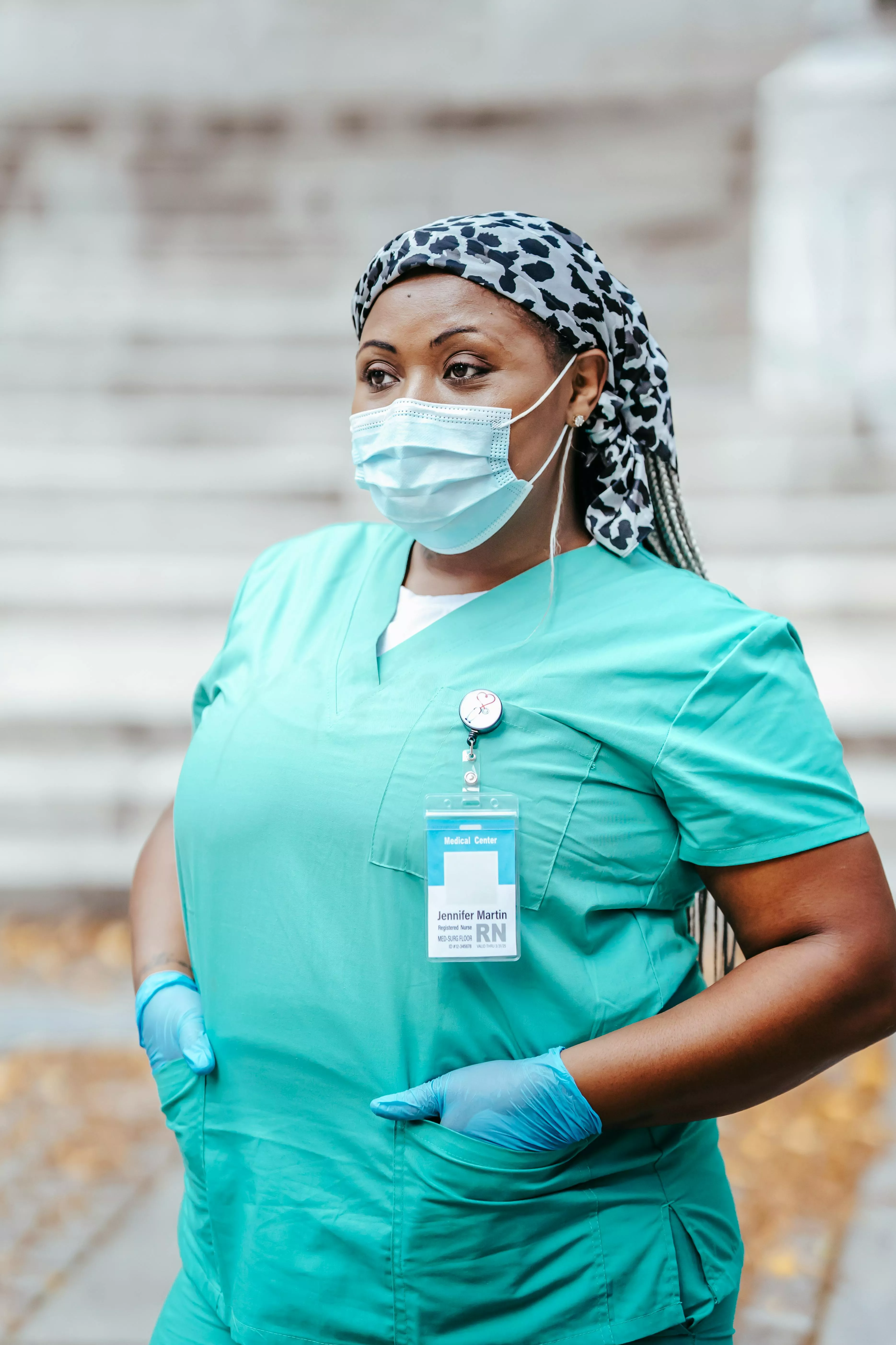 Black doctor in uniform with hands