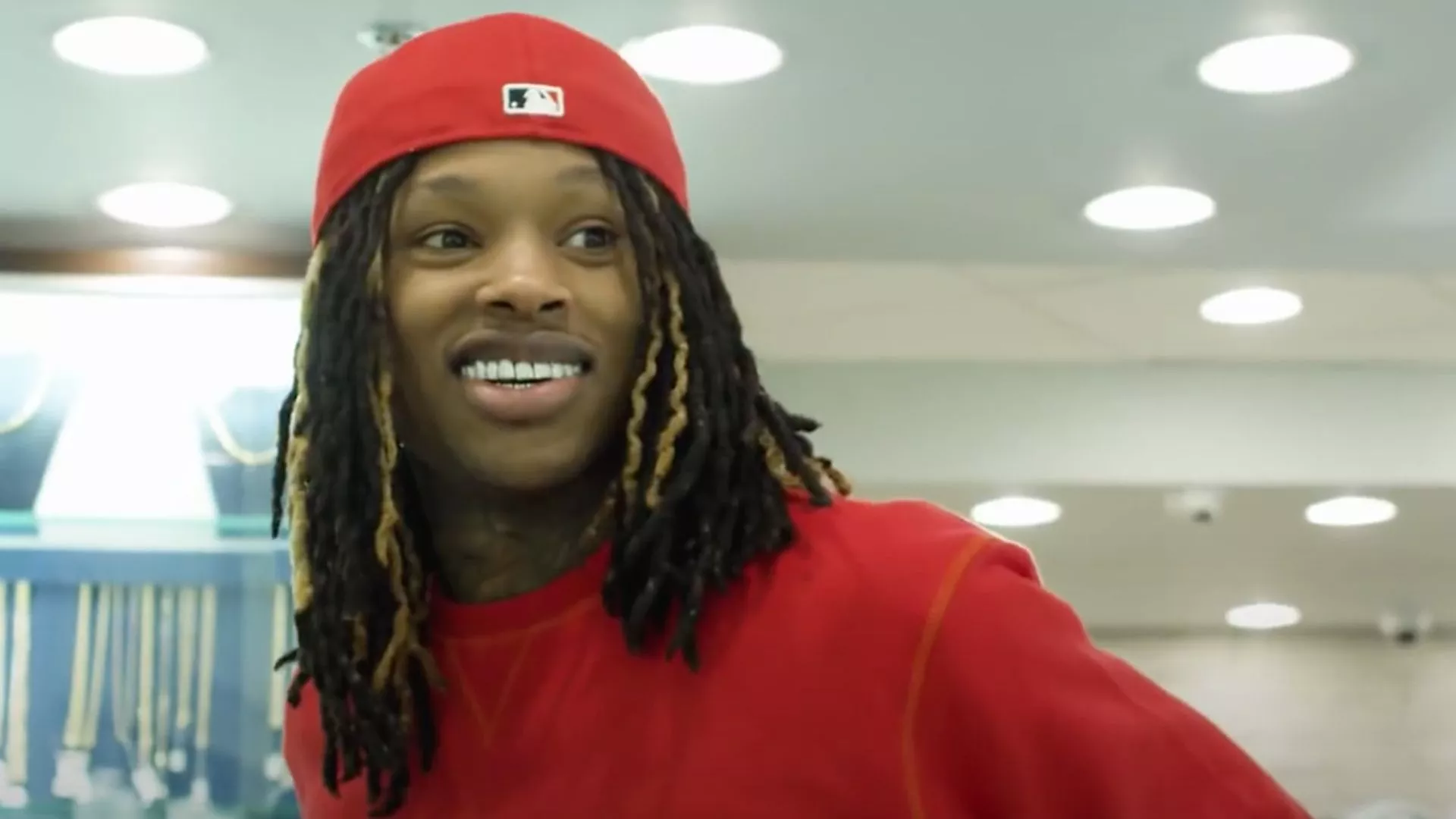 Smiley King Von Is Wearing Red Dress