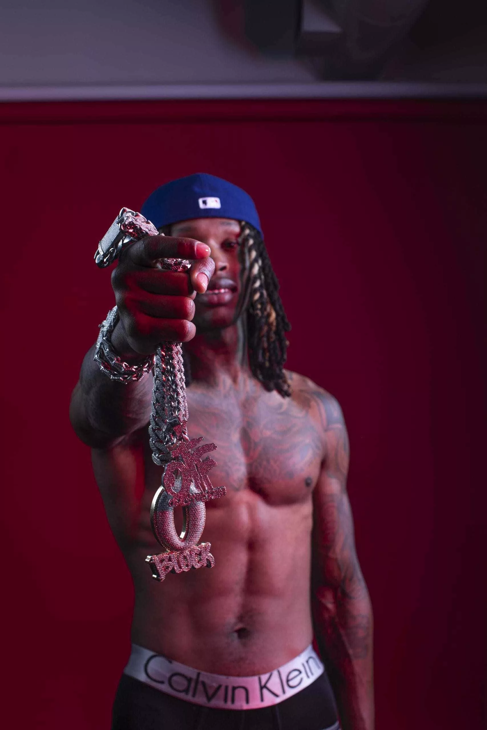 Download King Von striking a pose in an