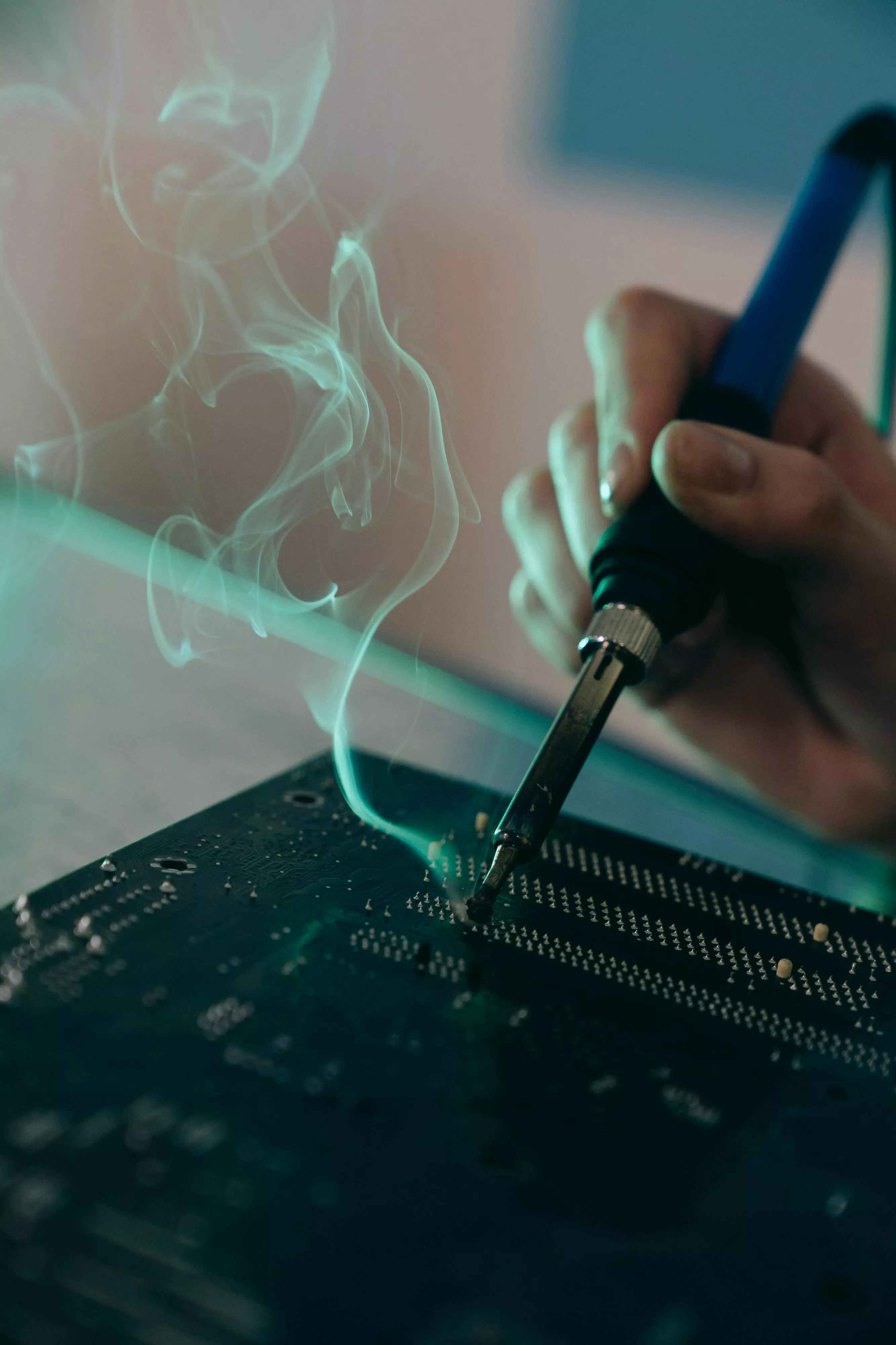 Holding Soldering Iron · Free
