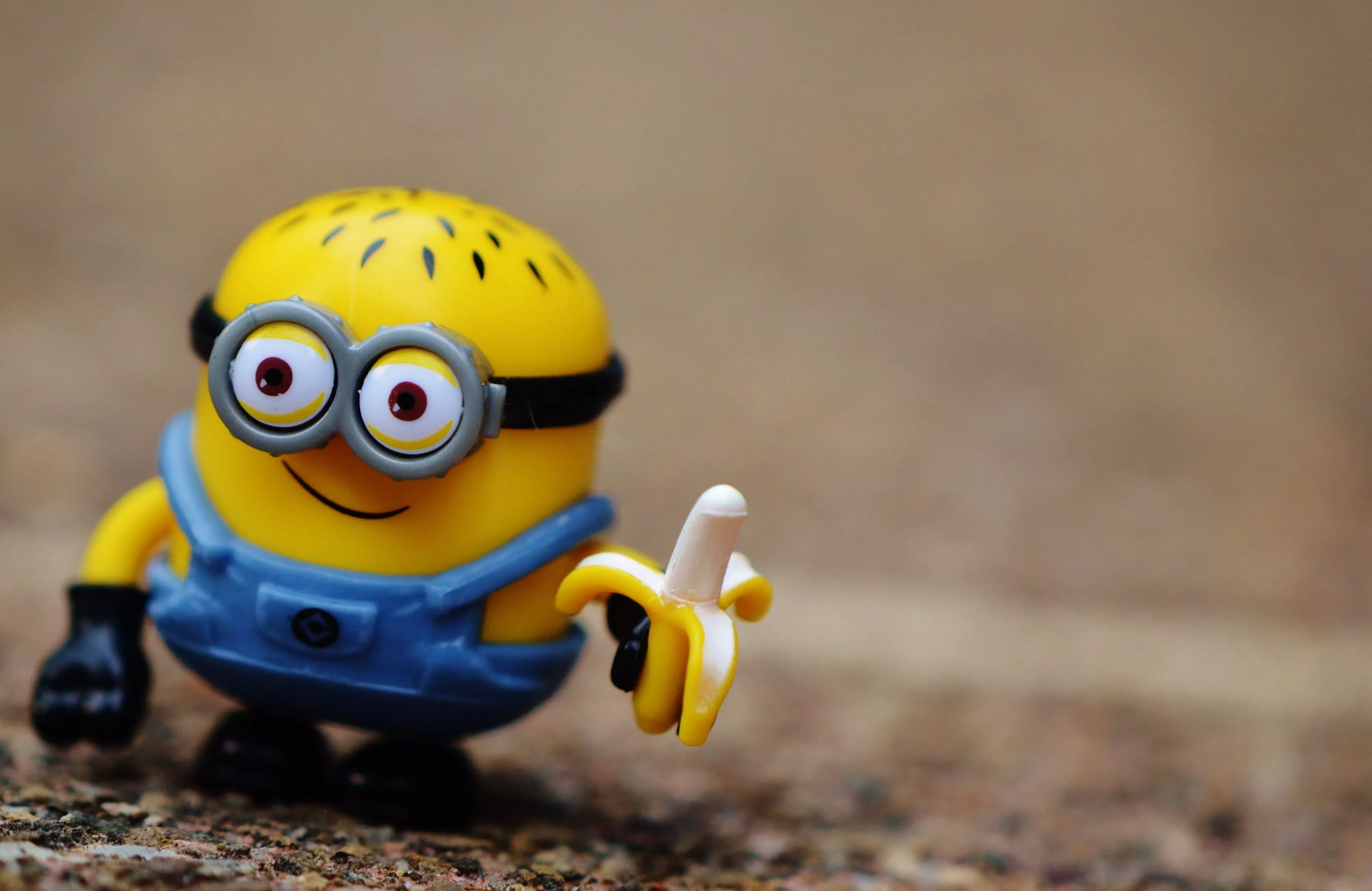 Minion holding banana plastic toy