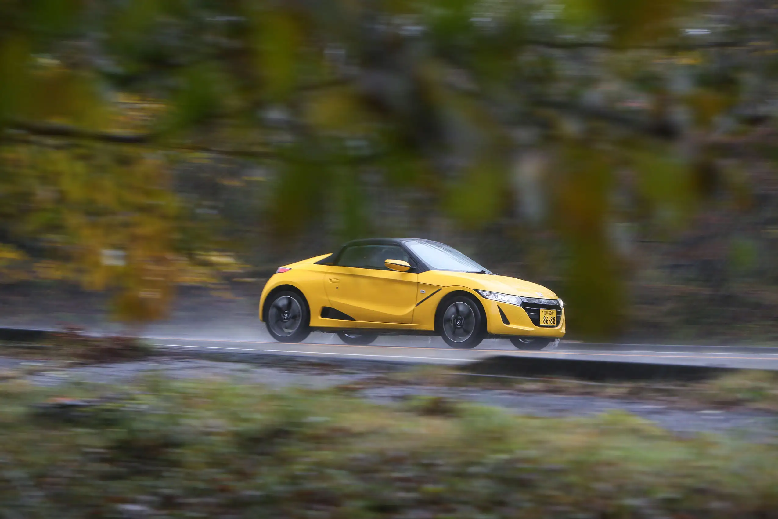 Honda and Daihatsu kei cars driven