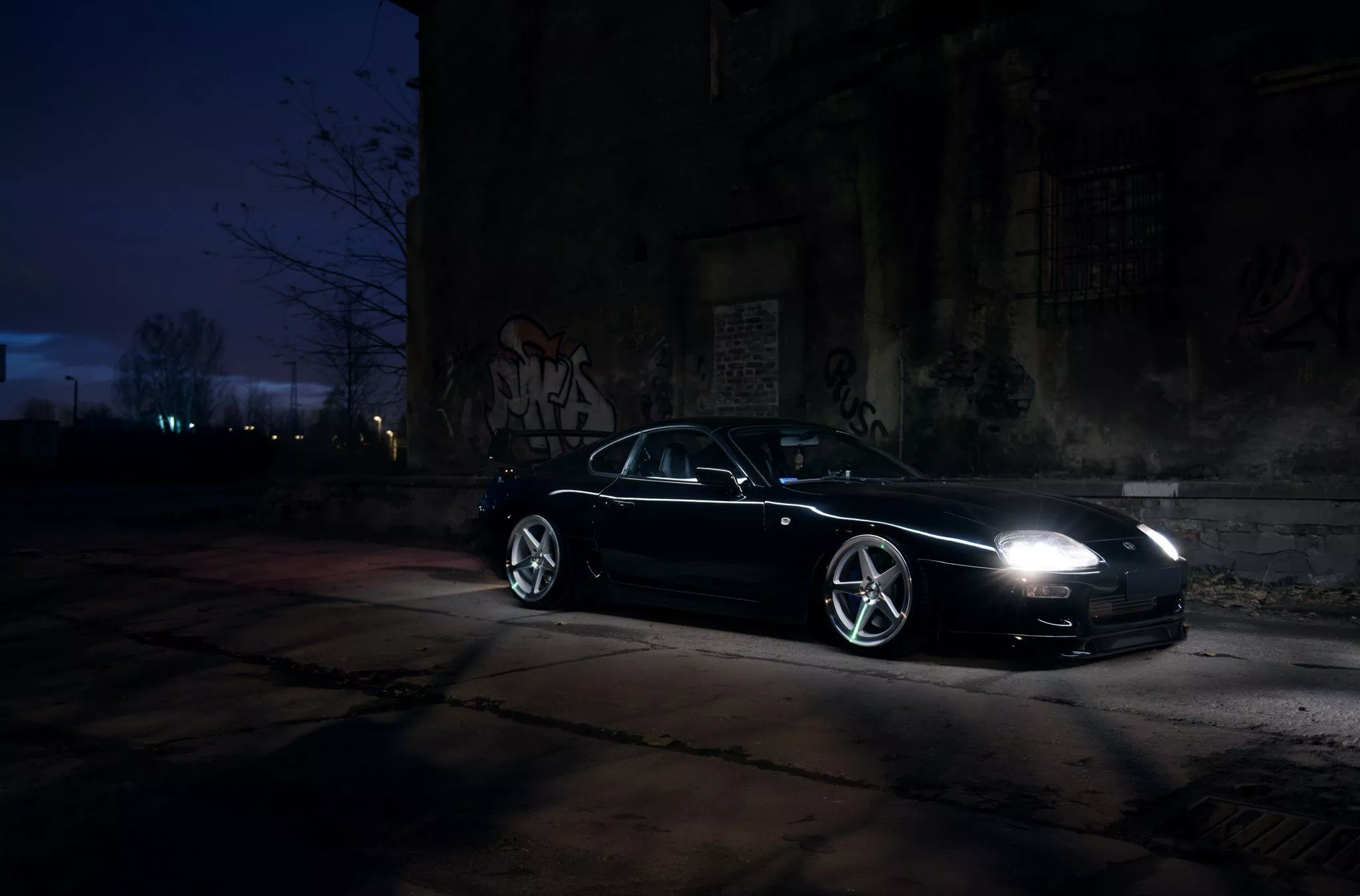 Black Toyota Supra Sitting Tight on a