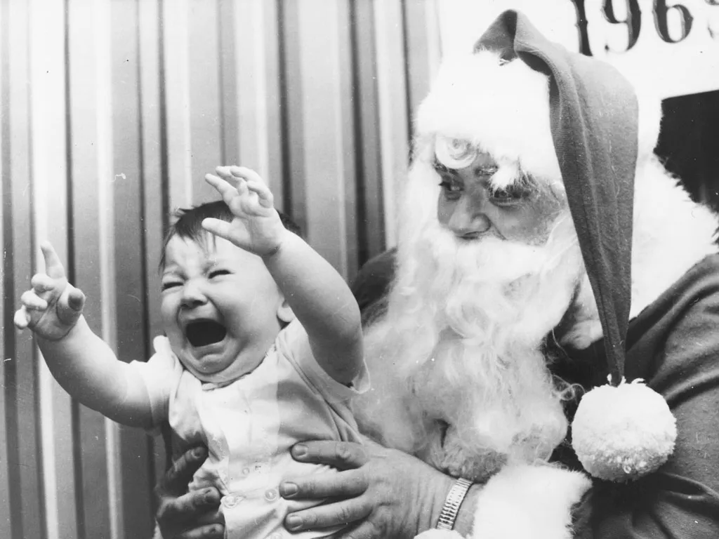 Kids Around the World Crying with Santa