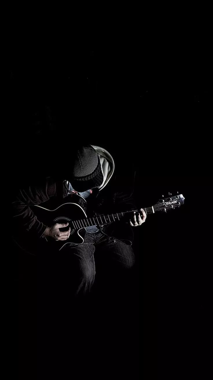 Out The Dark Guitar Player Music iPhone 8 Wallpaper