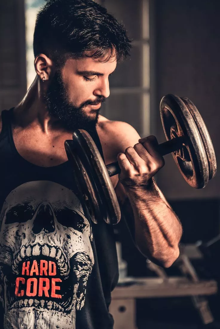 Photo of Man Lifting Dumbbell, adult