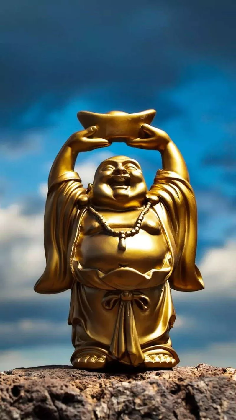Laughing Buddha Under The Blue Sky