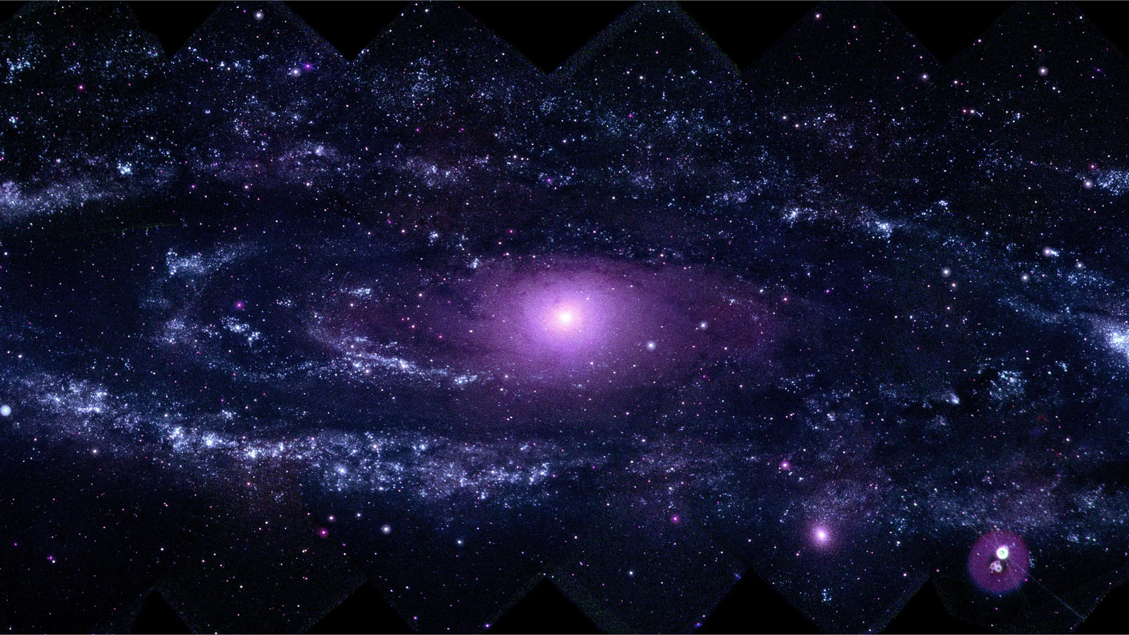 Incandescent Purple Galaxy On Black Sky